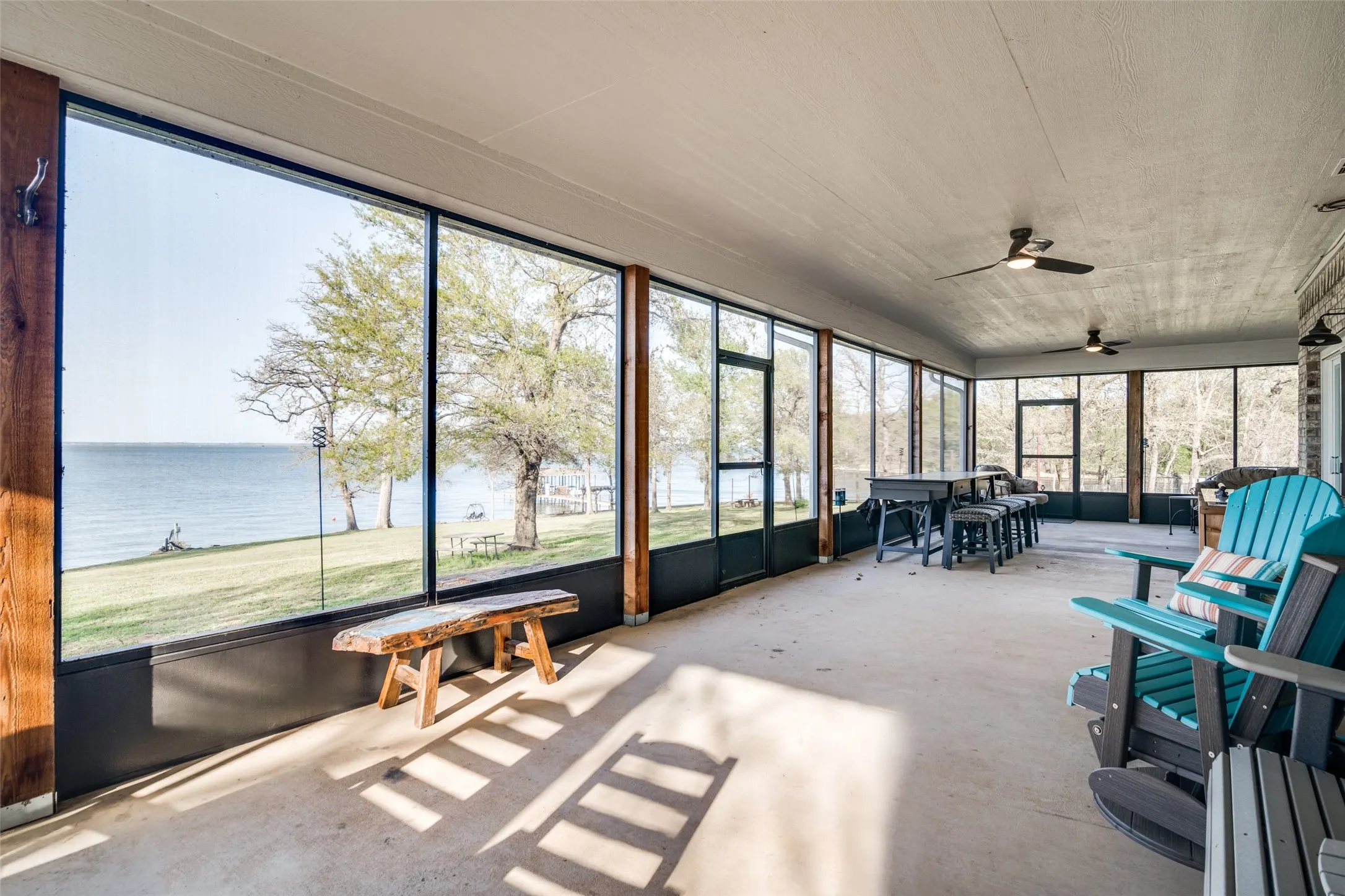 Sunroom with a water view and plenty of natural light