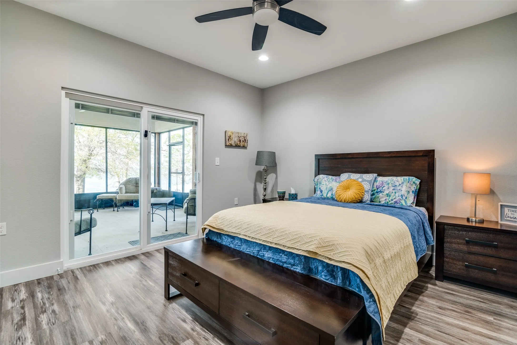 Bedroom with exterior access and lake view