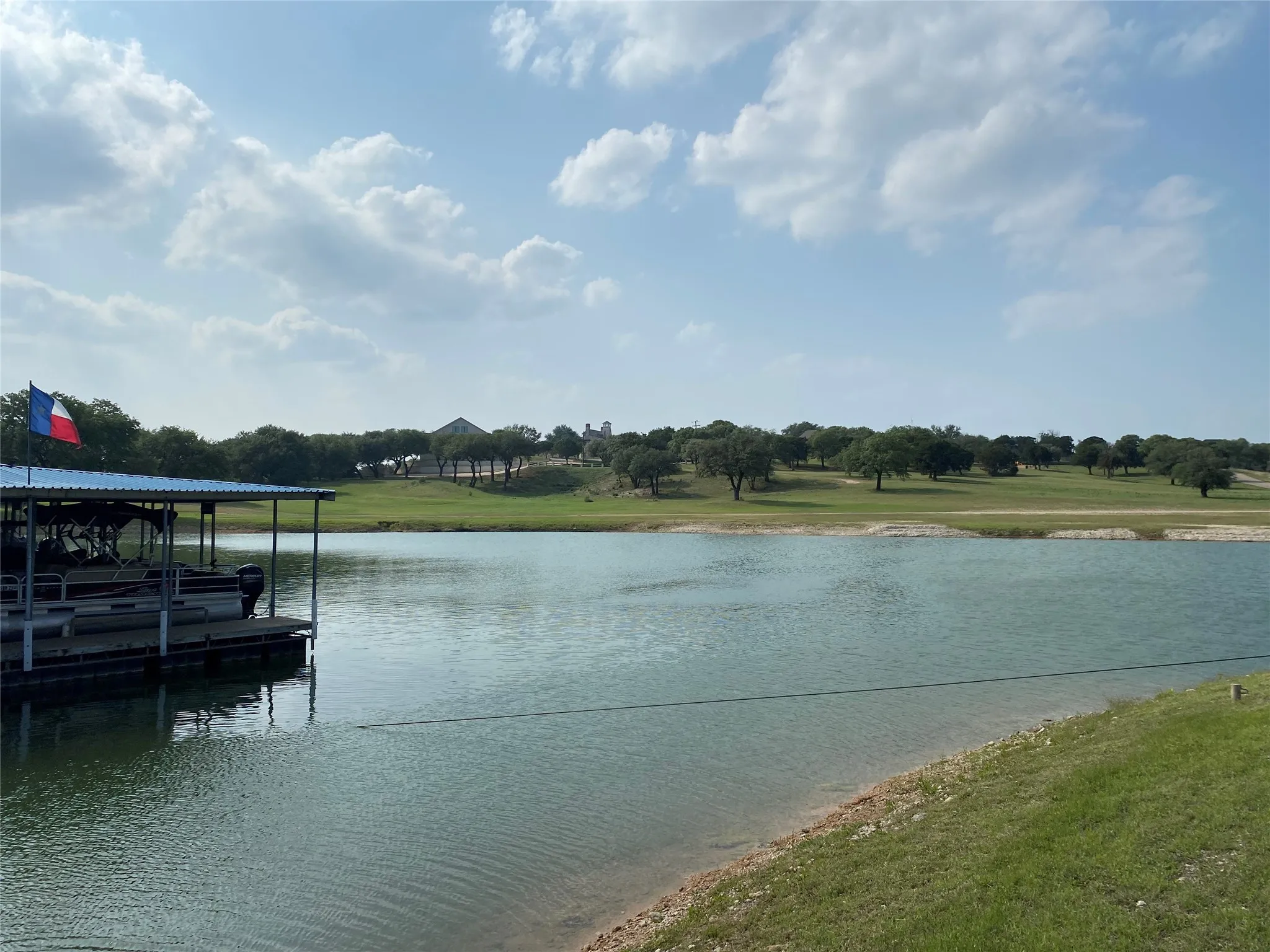 Water view featuring a dock