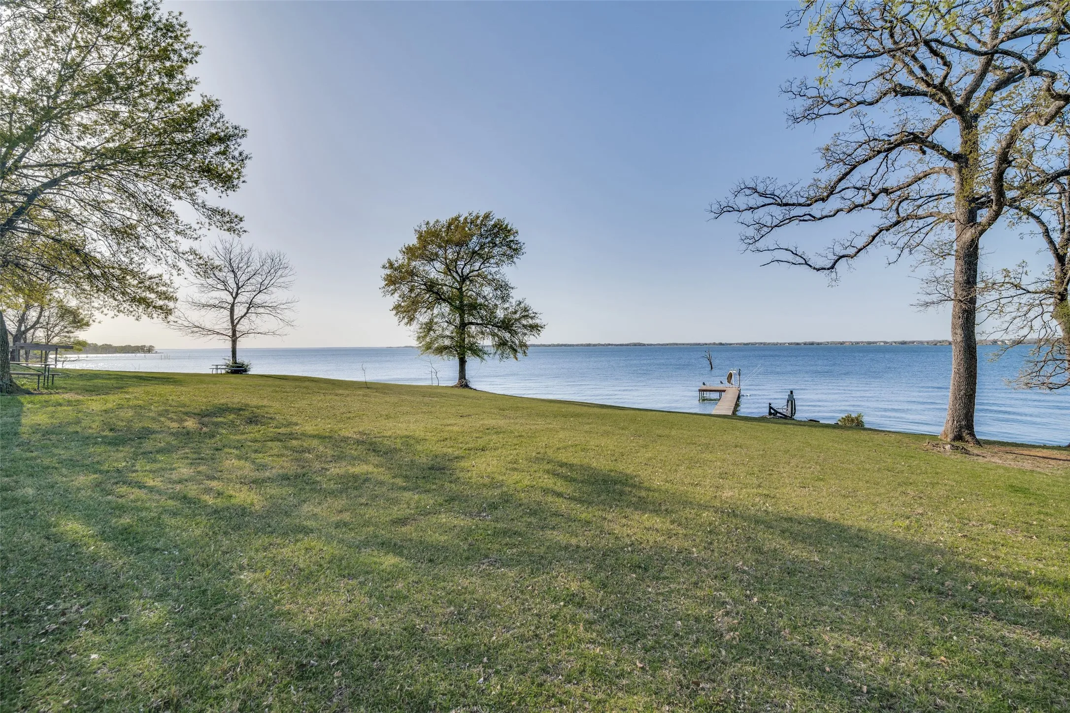 Property view of water and fishing dock