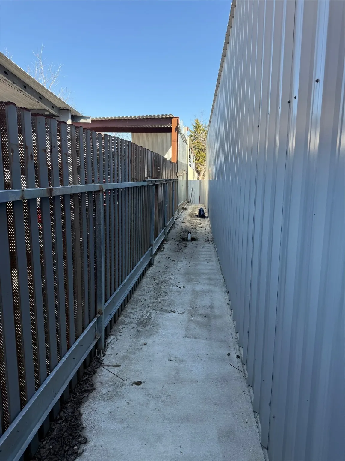 View of patio with fence