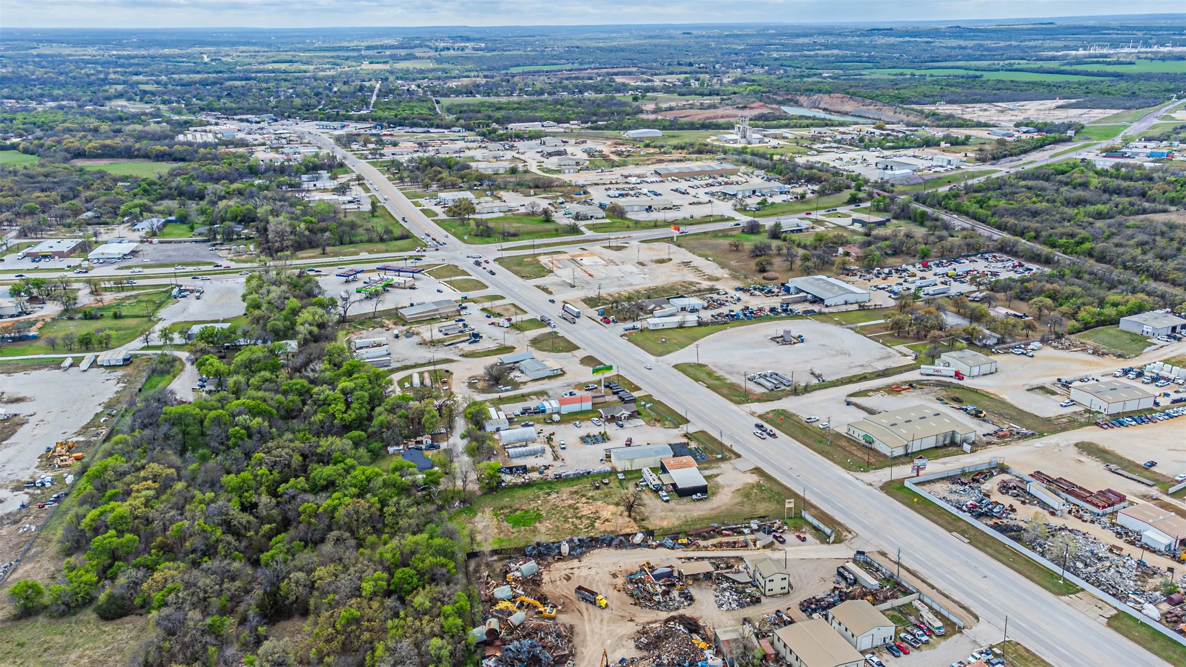Aerial view showing many surrounding business and roadways