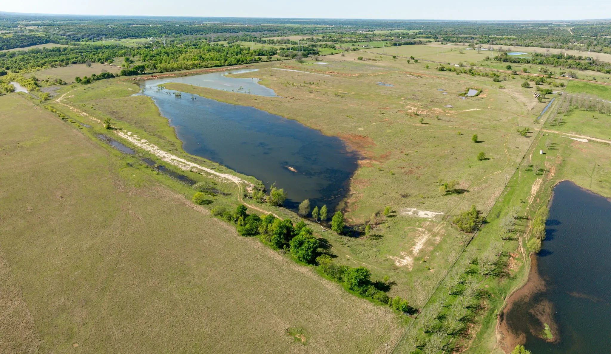 Drone / aerial view with a rural view and a water view
