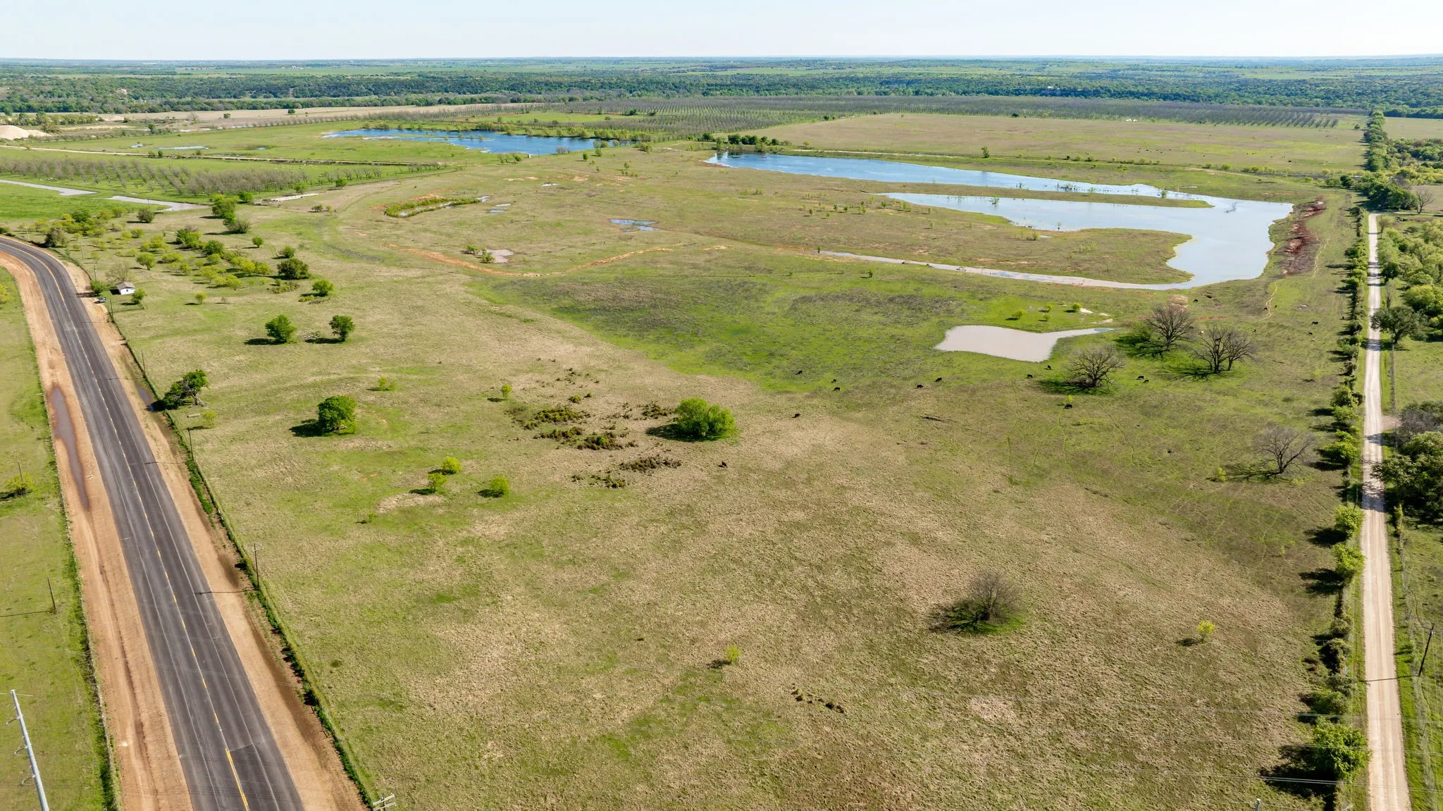 Bird's eye view featuring a water view and a rural view