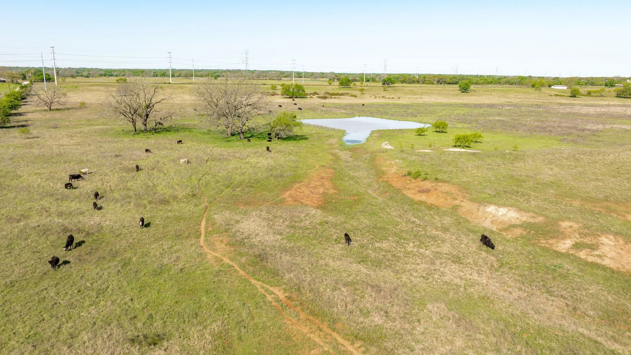 Aerial view with a water view and a rural view