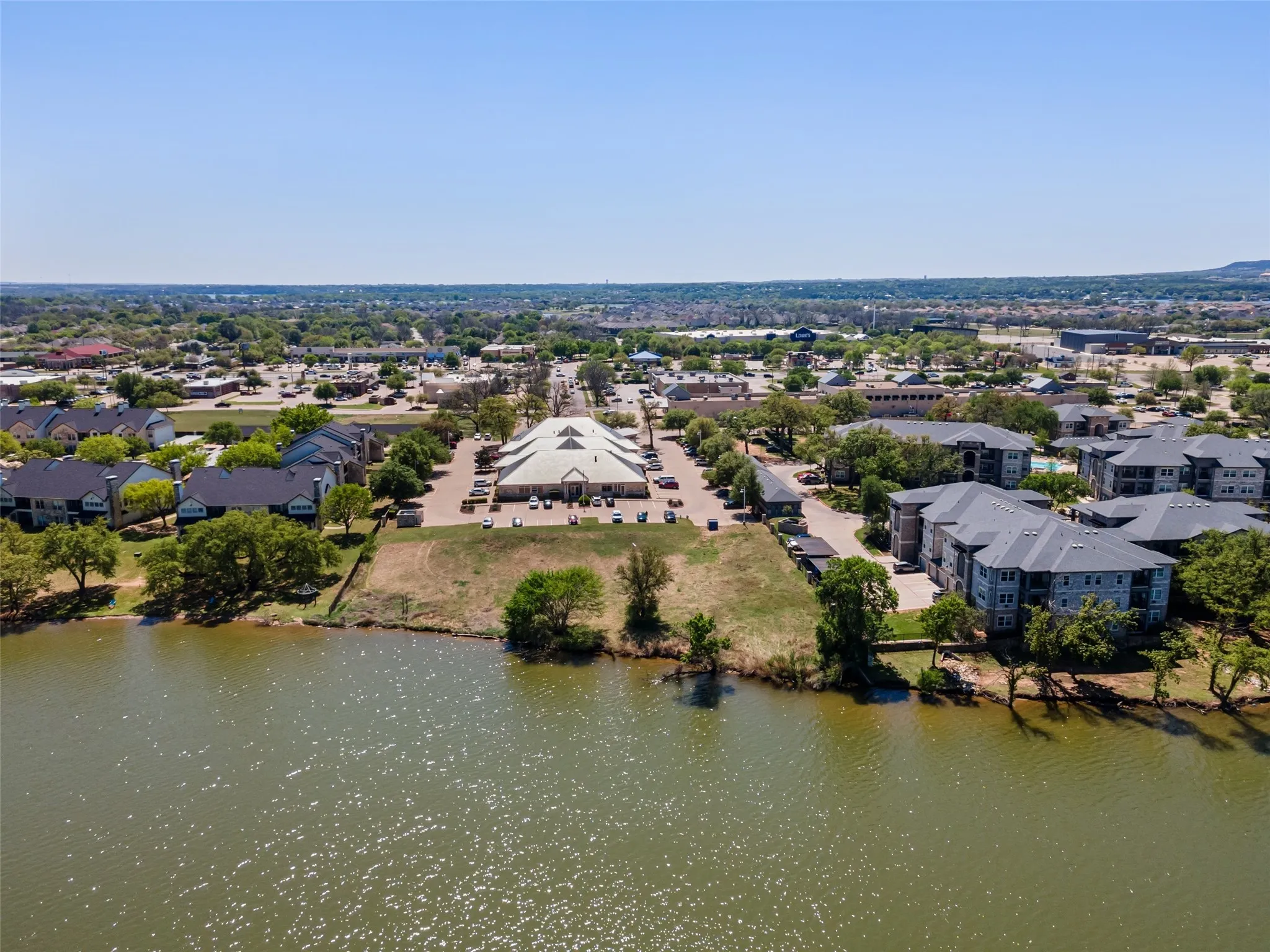 Aerial view with a residential view and a water view