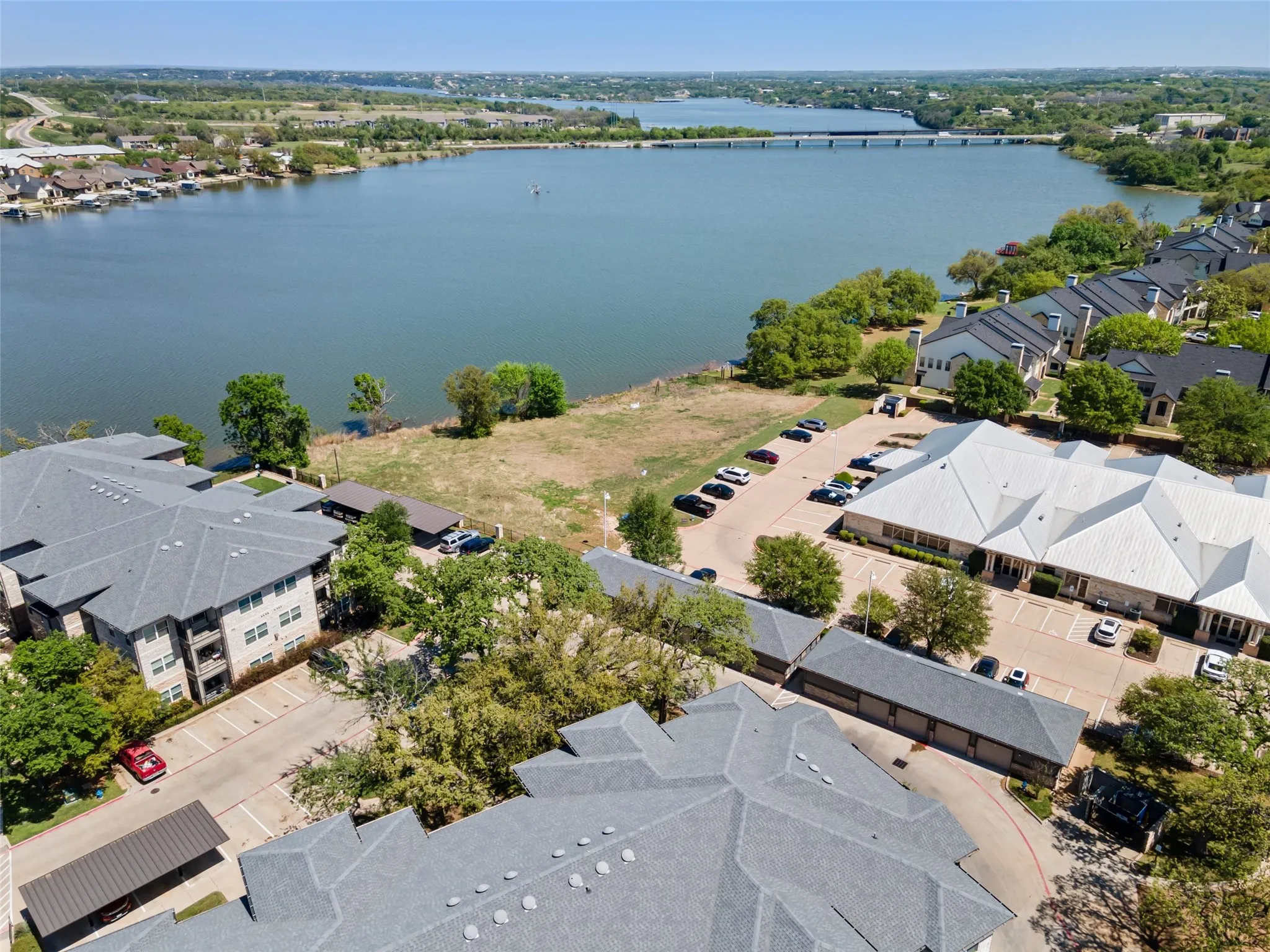 Aerial view with a water view and a residential view