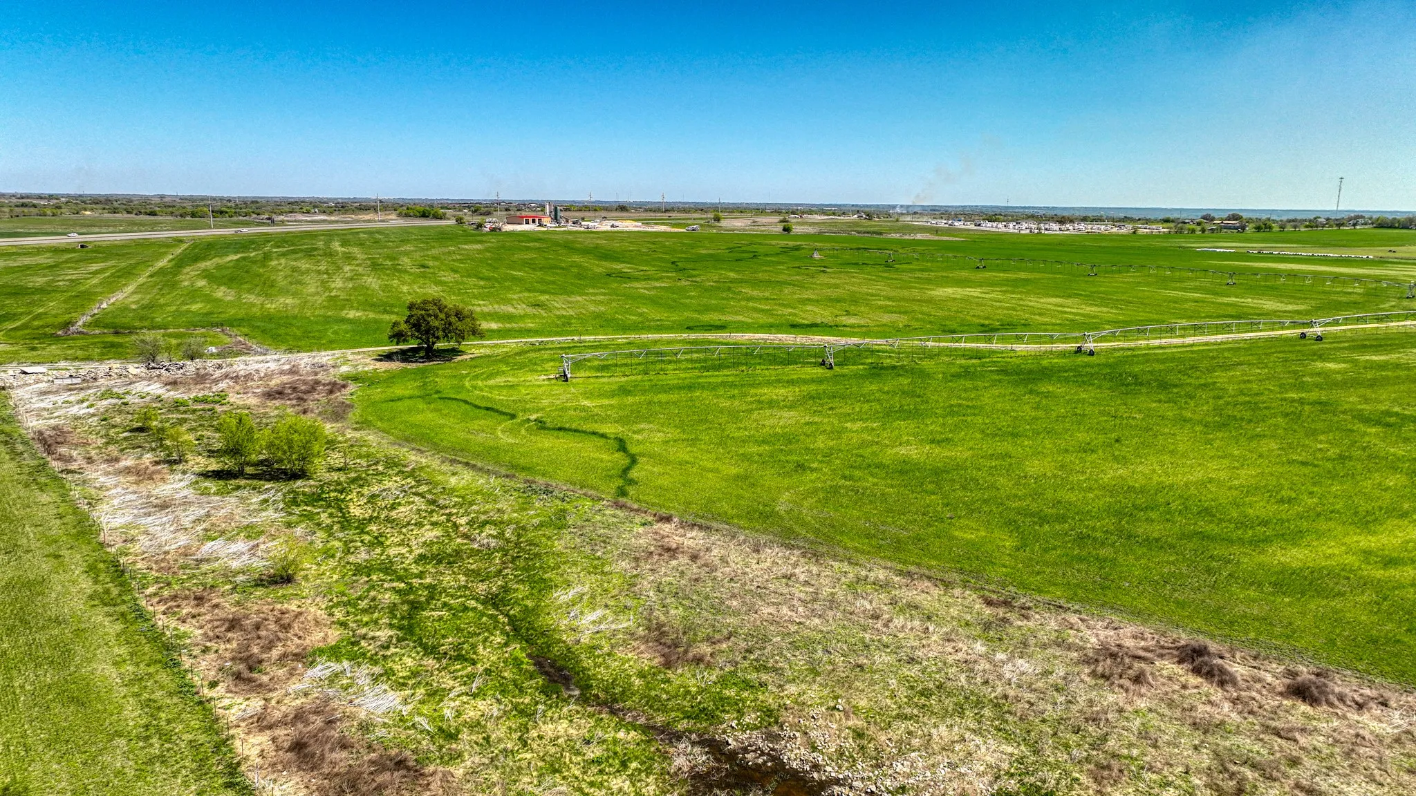 Birds eye view of property featuring a rural view