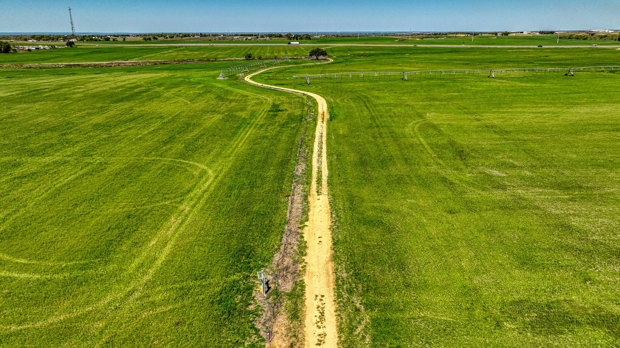 Birds eye view of property with a rural view
