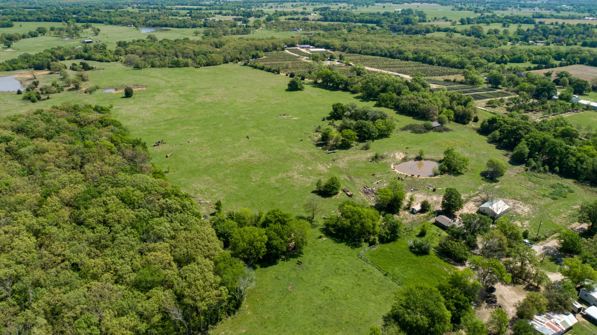 Birds eye view of property with a rural view