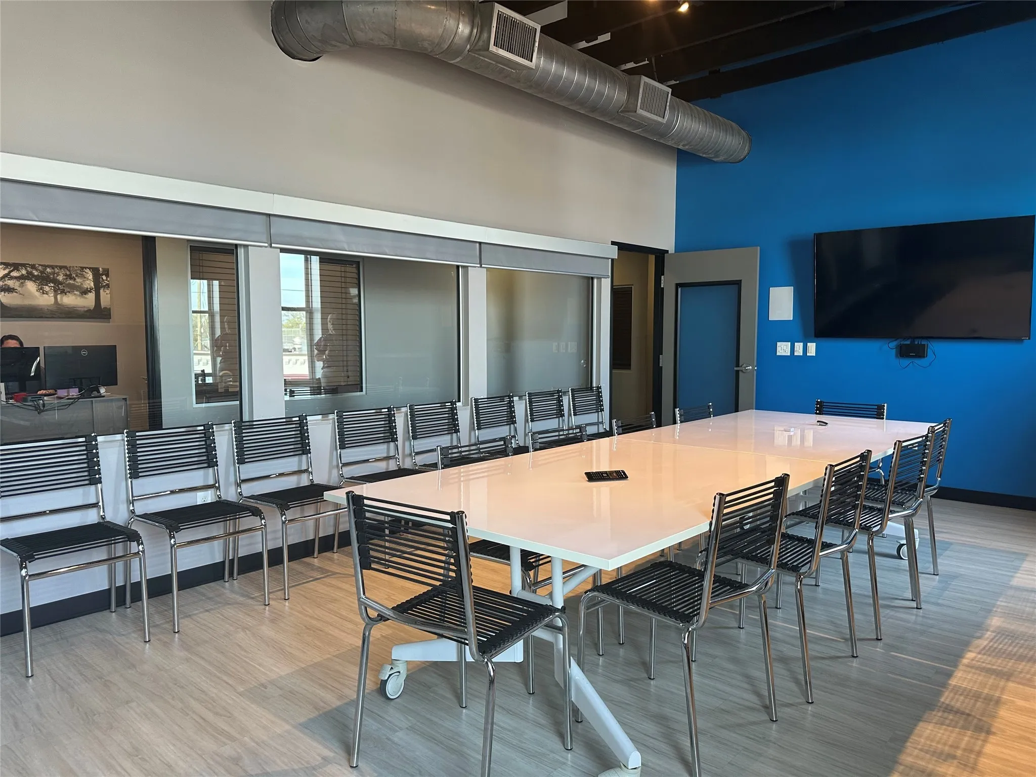 Conference room with large TV with video conferencing & PowerPoint capabilities