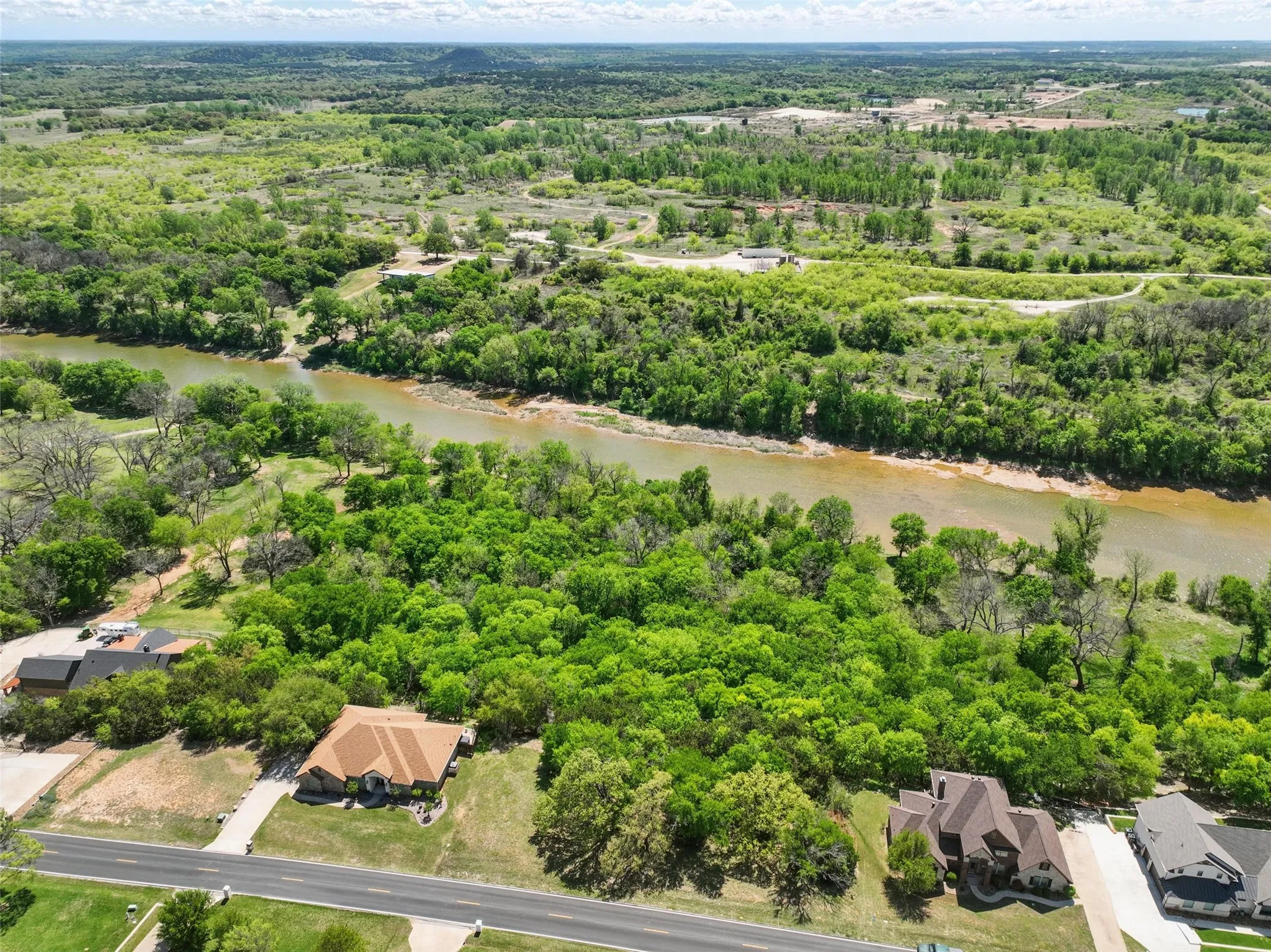 Aerial perspective showing proximity to the Brazos River.