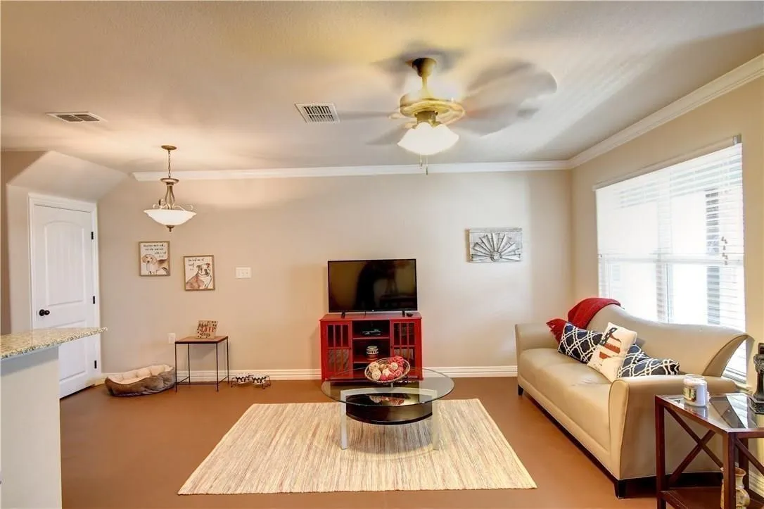 Living/Dining roon, front door, decorative light, ceiling fan