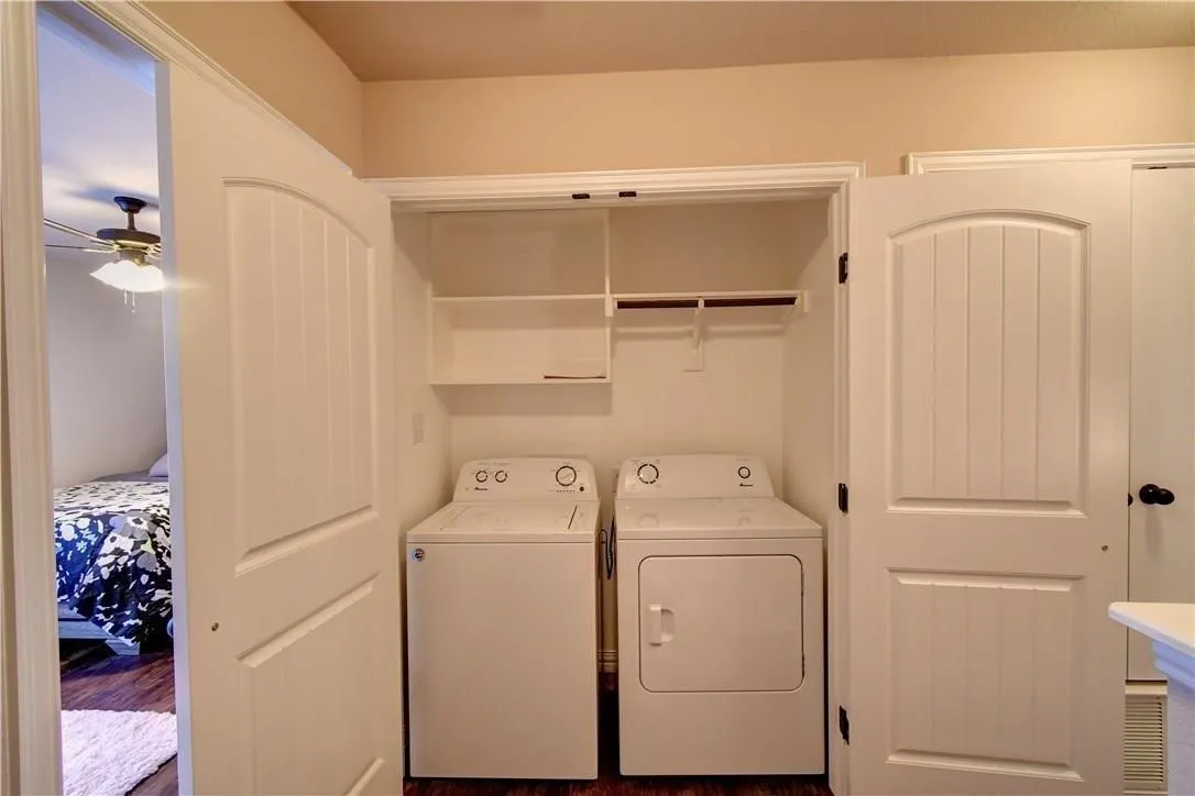 Full size washer/drive, laundry closet, shelves