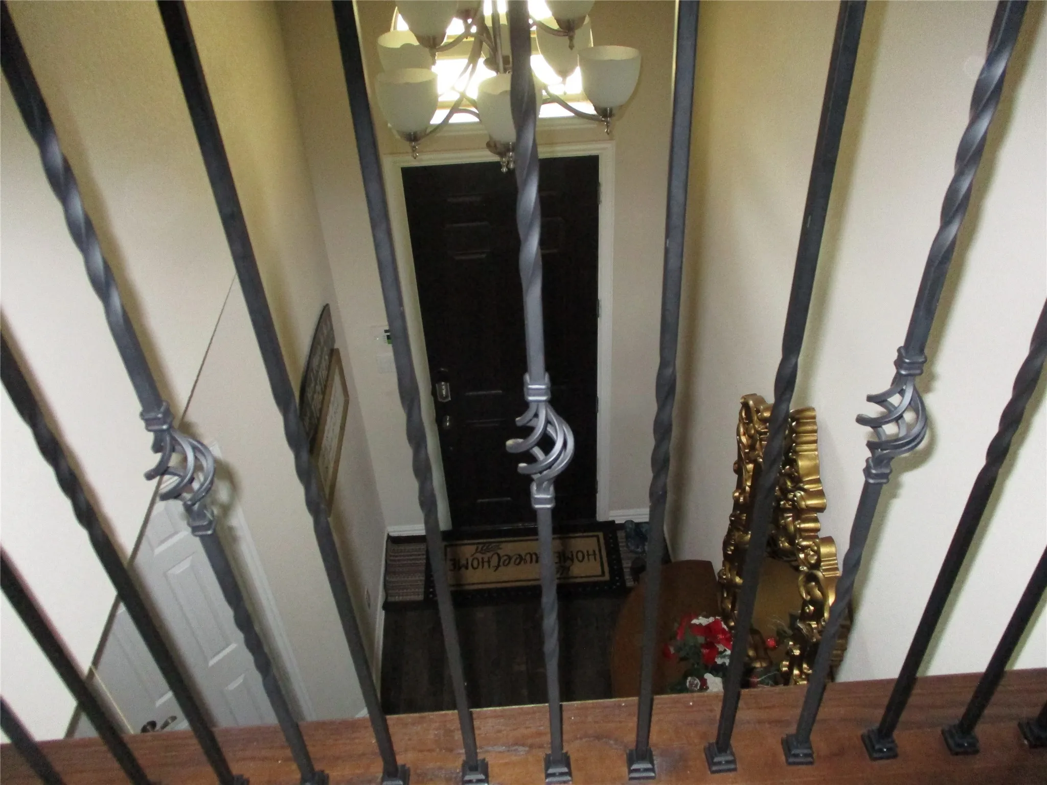 Entrance foyer with a notable chandelier