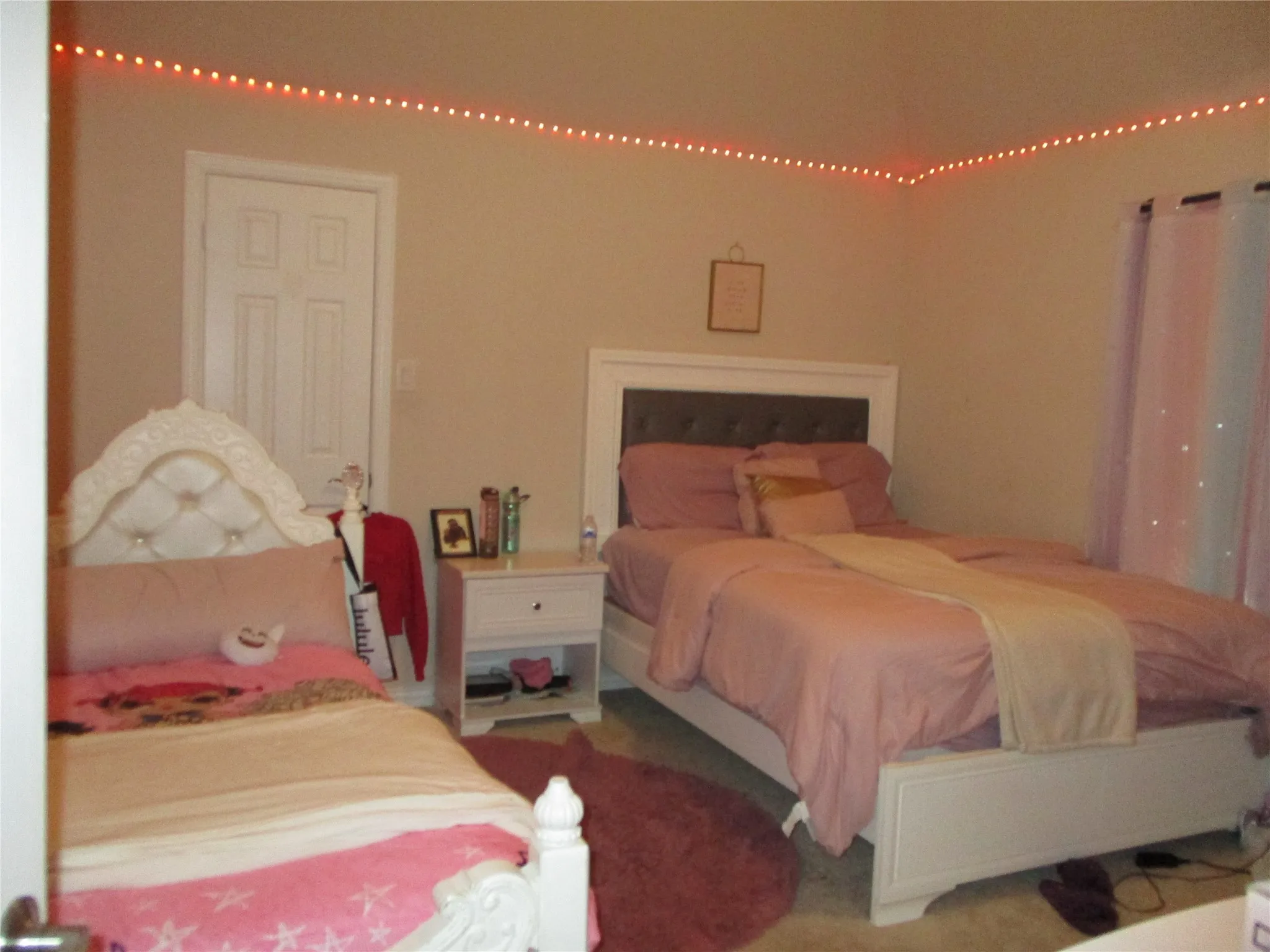 Bedroom featuring carpet floors