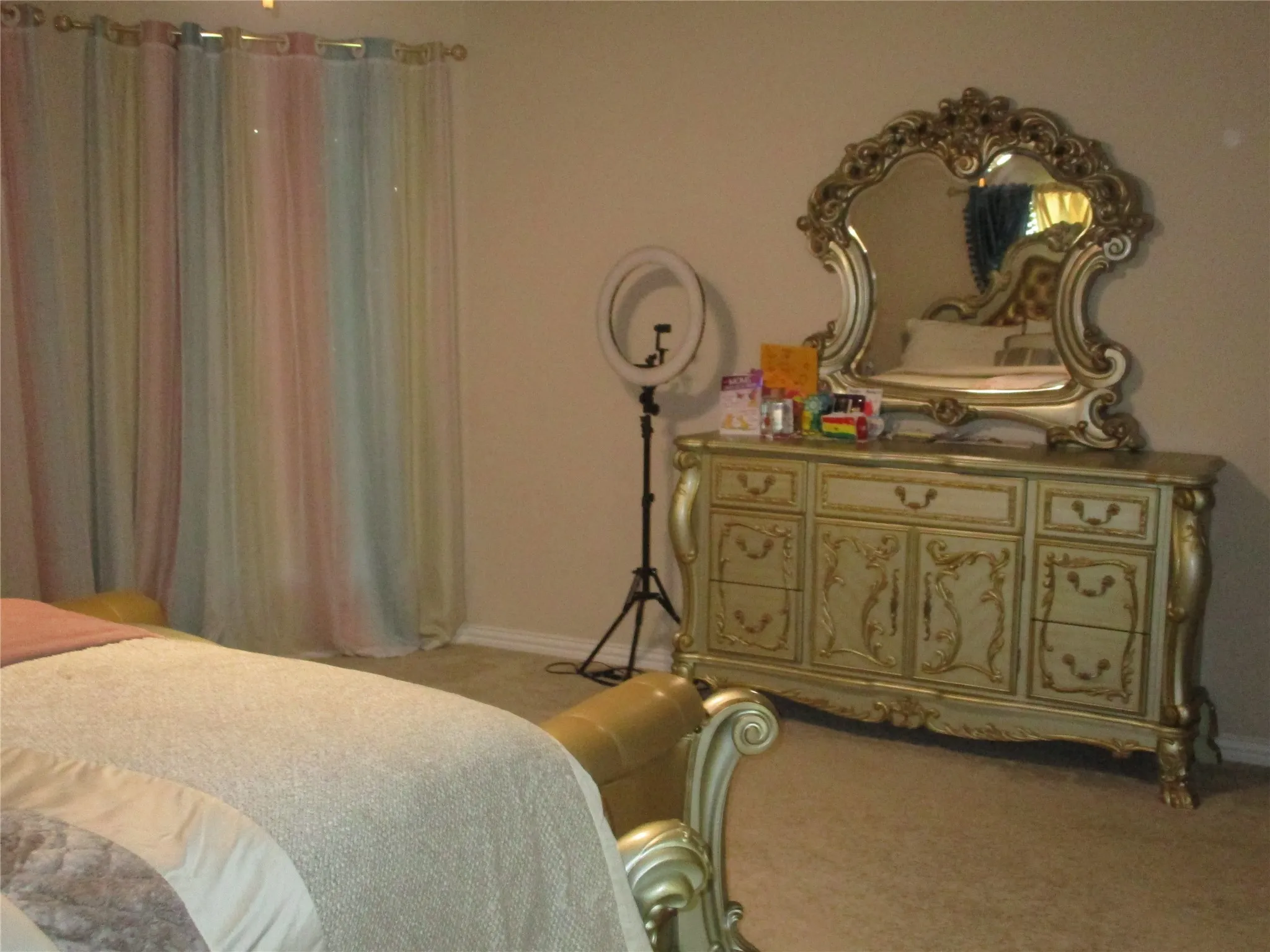 Carpeted bedroom featuring baseboards