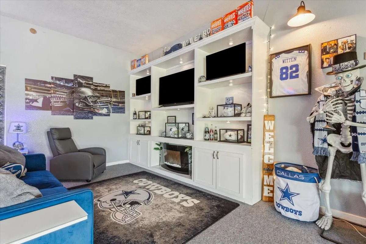 Living room featuring carpet