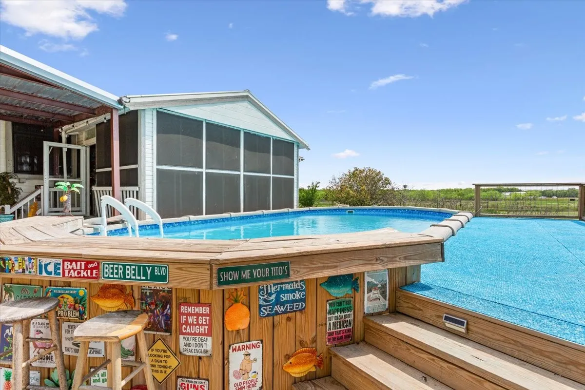 Pool with a sunroom