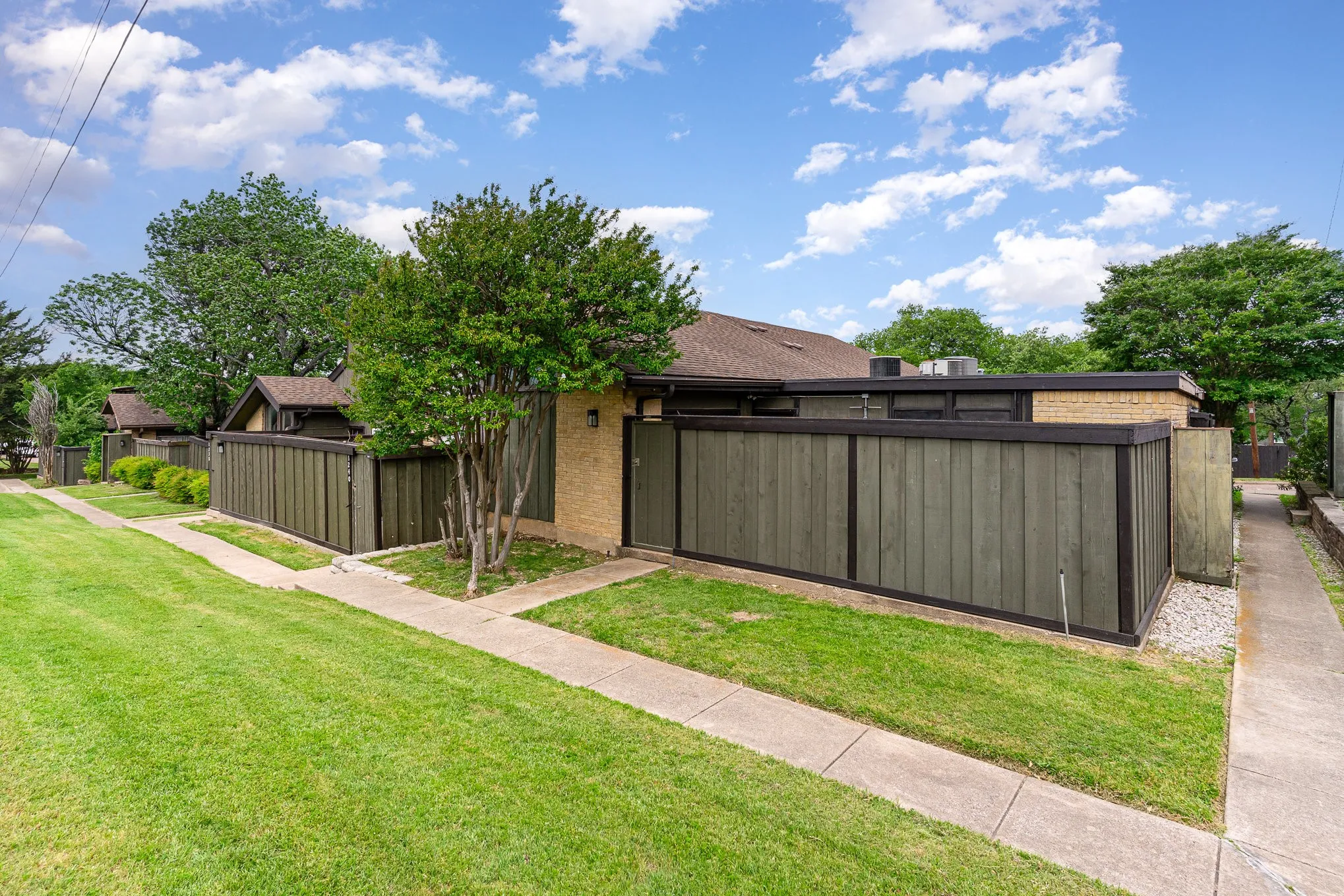 View of yard featuring fence