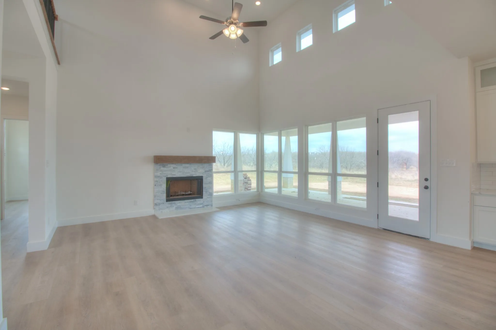 View of living room and fire place.