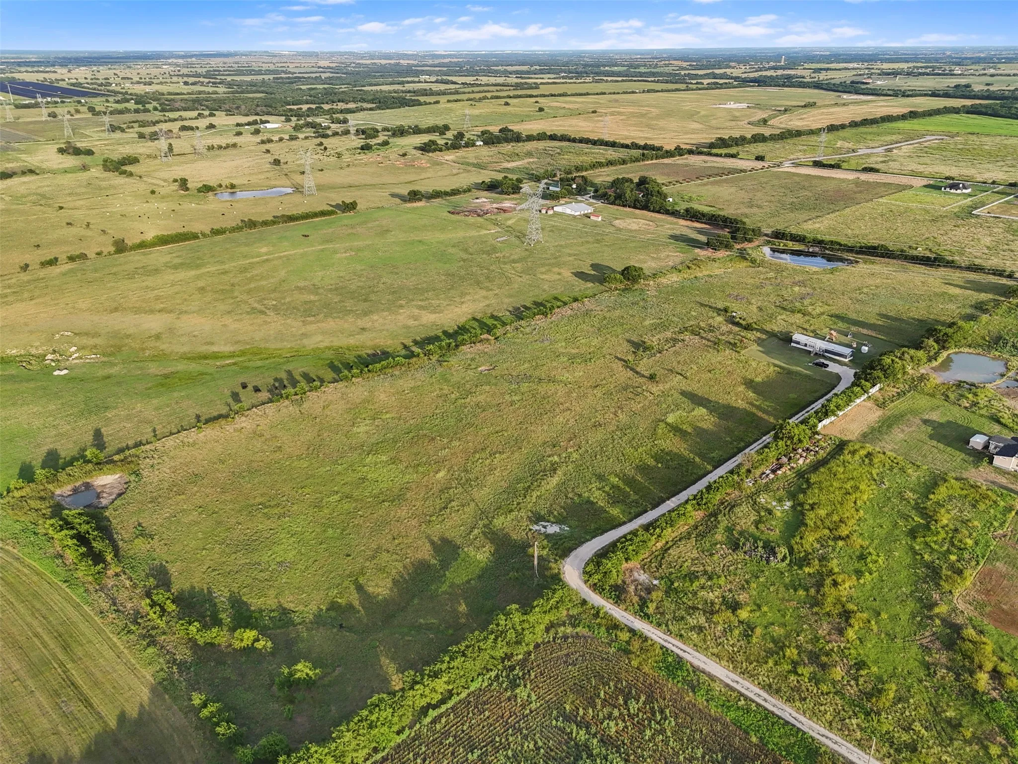 Aerial overview of property's location with rural landscape