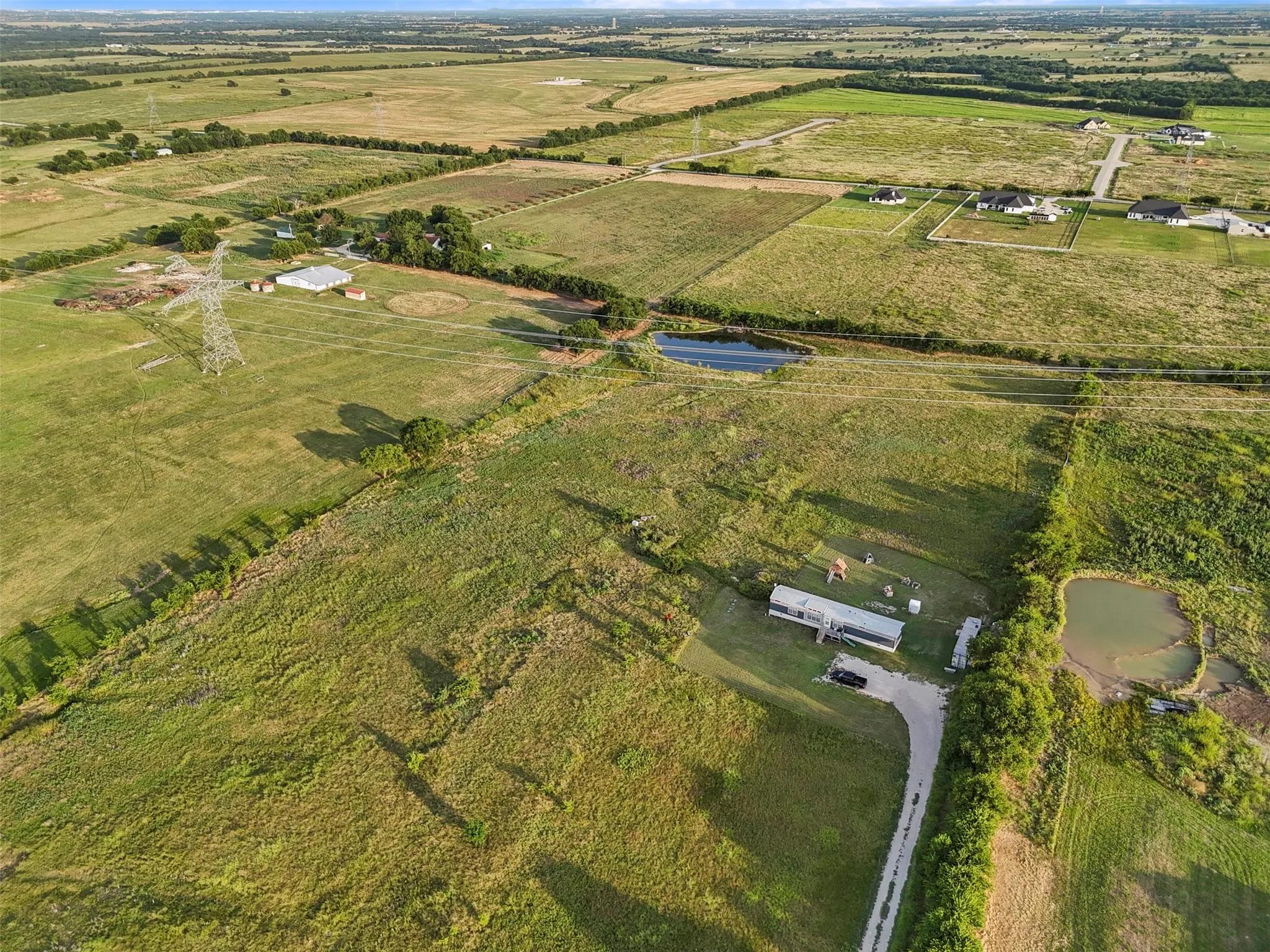 Aerial overview of property's location with rural landscape