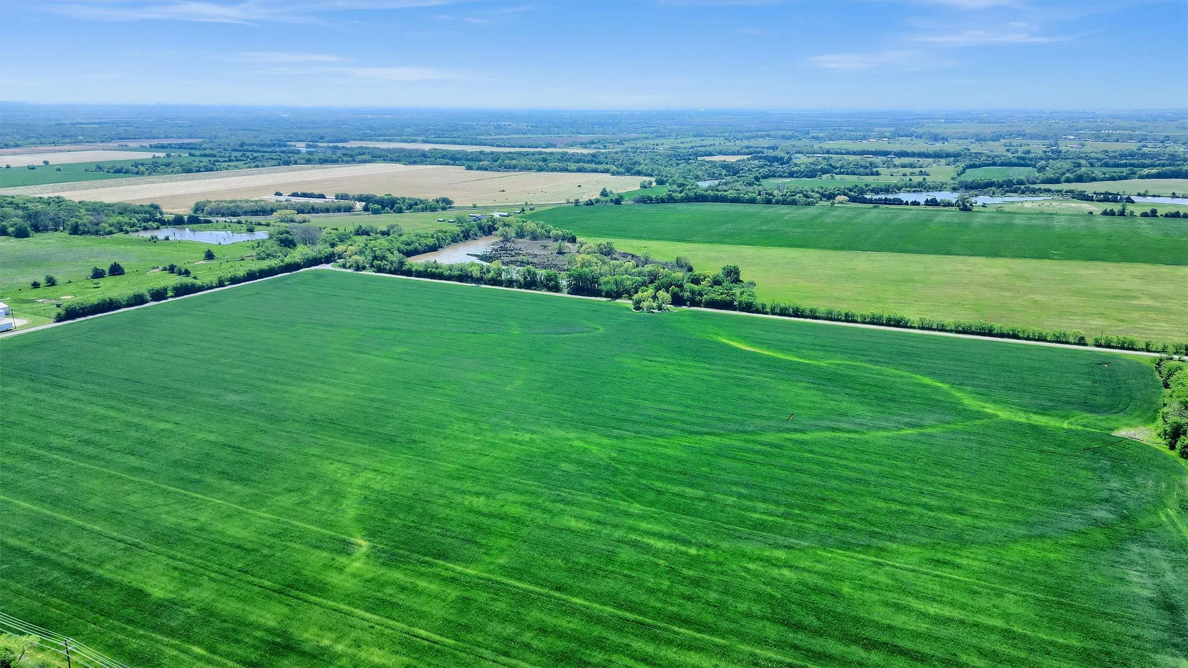 Drone / aerial view with a rural view and a water view
