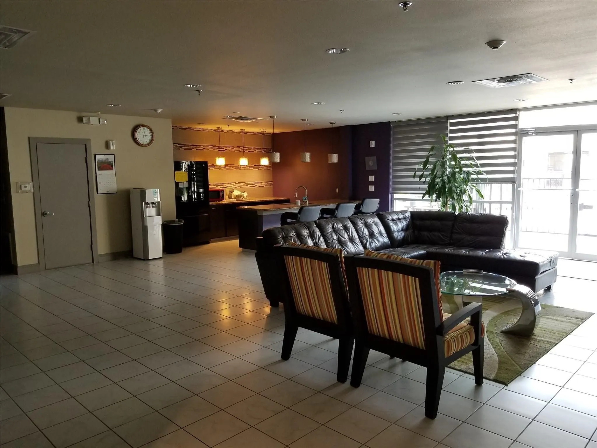 Community lobby featuring a sink and visible vents