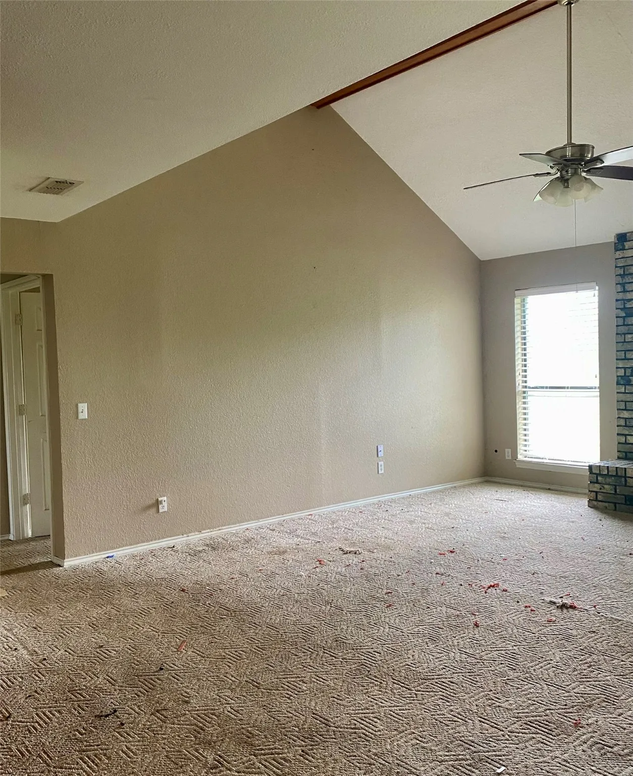 Living room with vaulted ceiling
