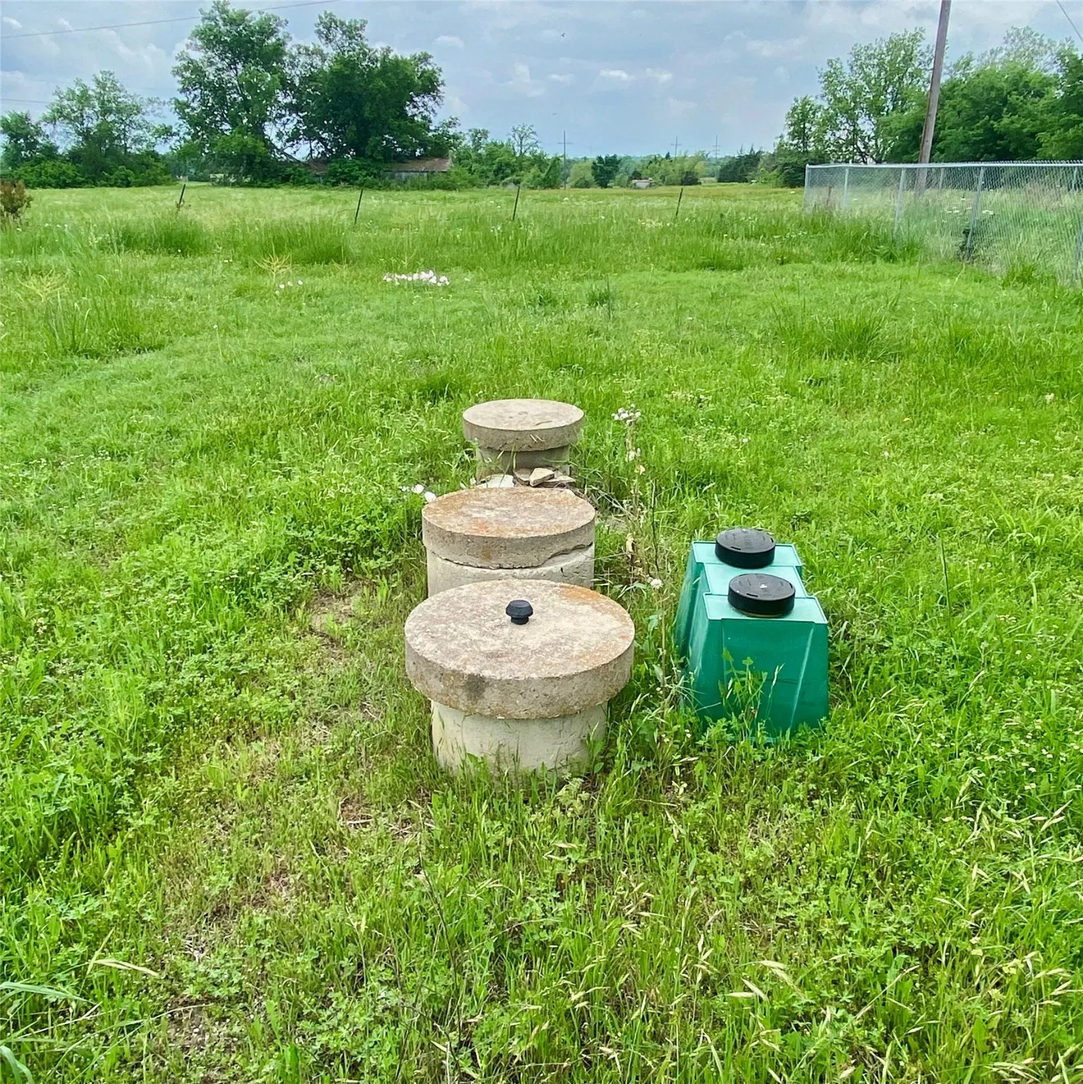 Aerobic septic system east of house