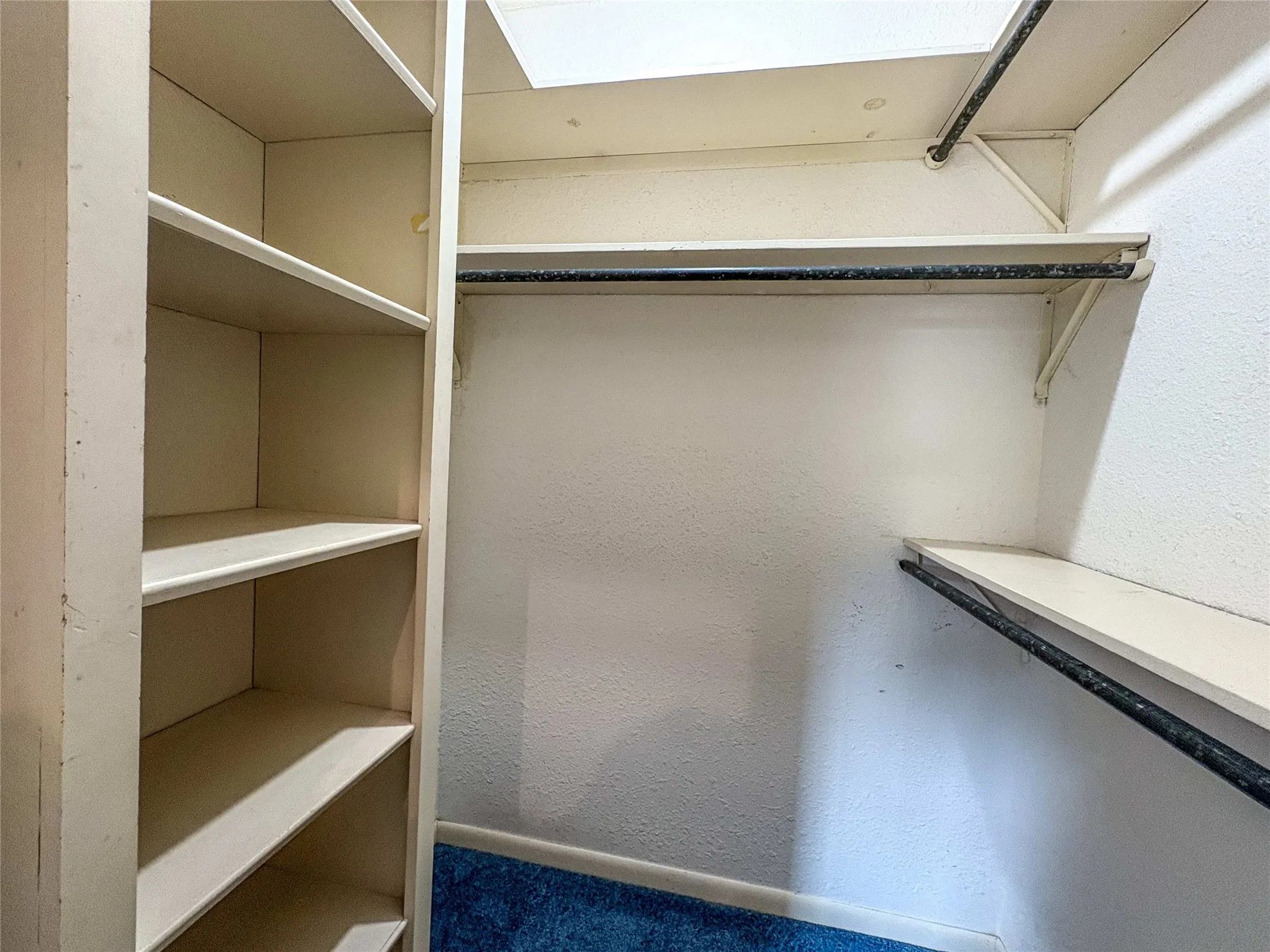 WALK IN CLOSET WITH SKYLIGHT