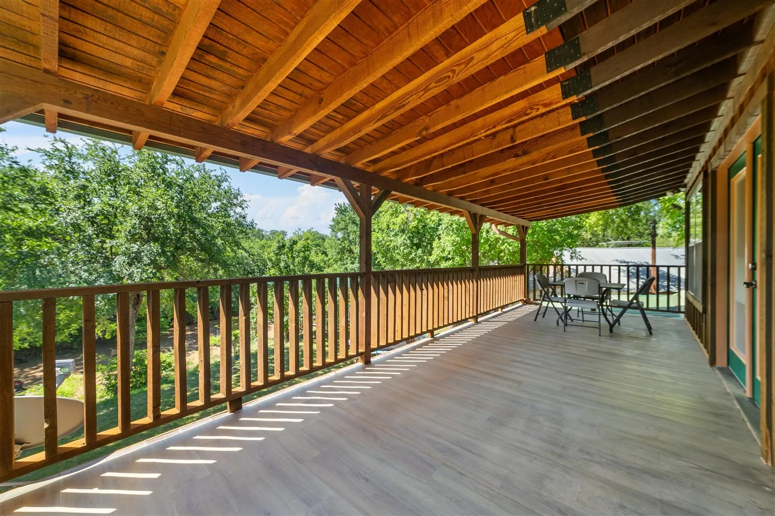 Wooden deck with outdoor dining space