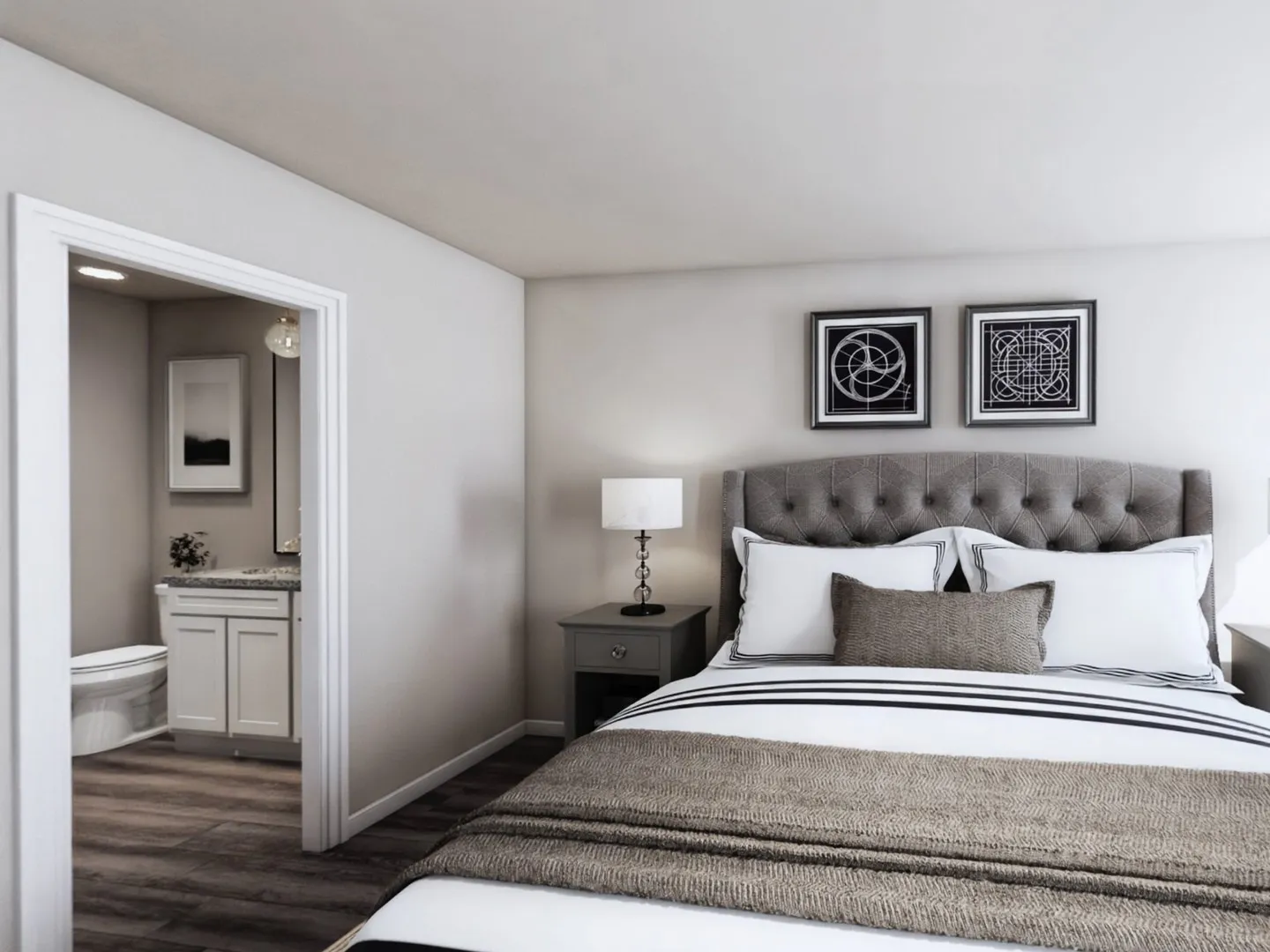 Bedroom featuring dark wood finished floors, baseboards, and connected bathroom