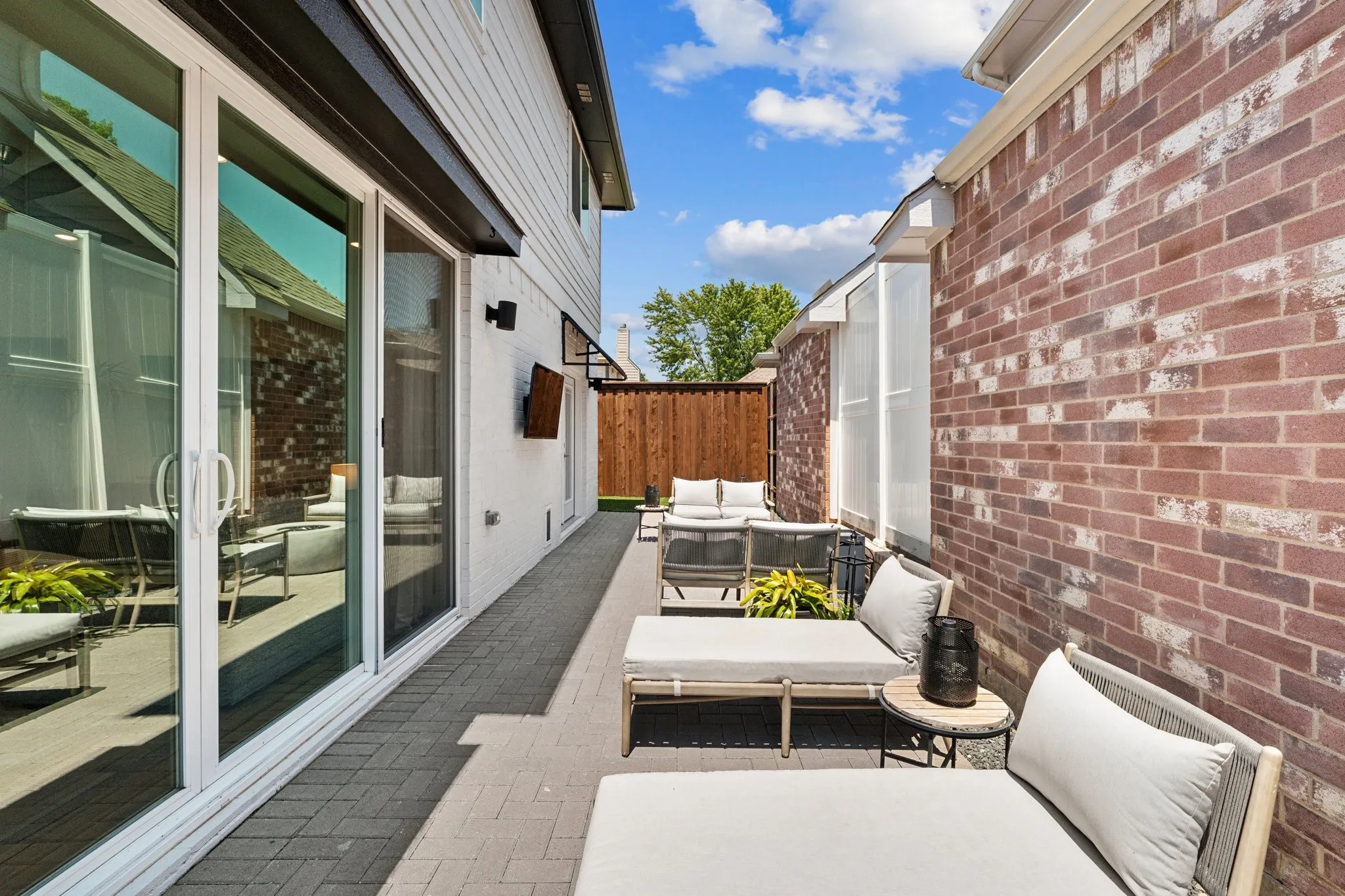 View of patio with an outdoor hangout area