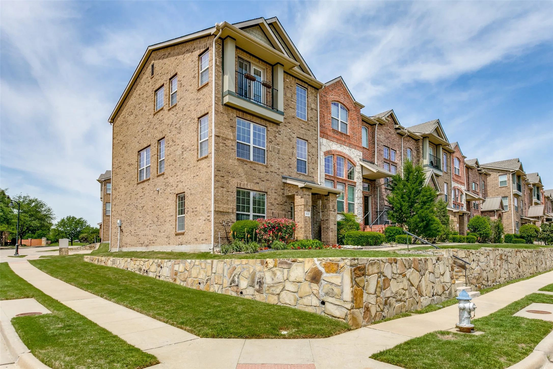 View of building exterior with a residential view