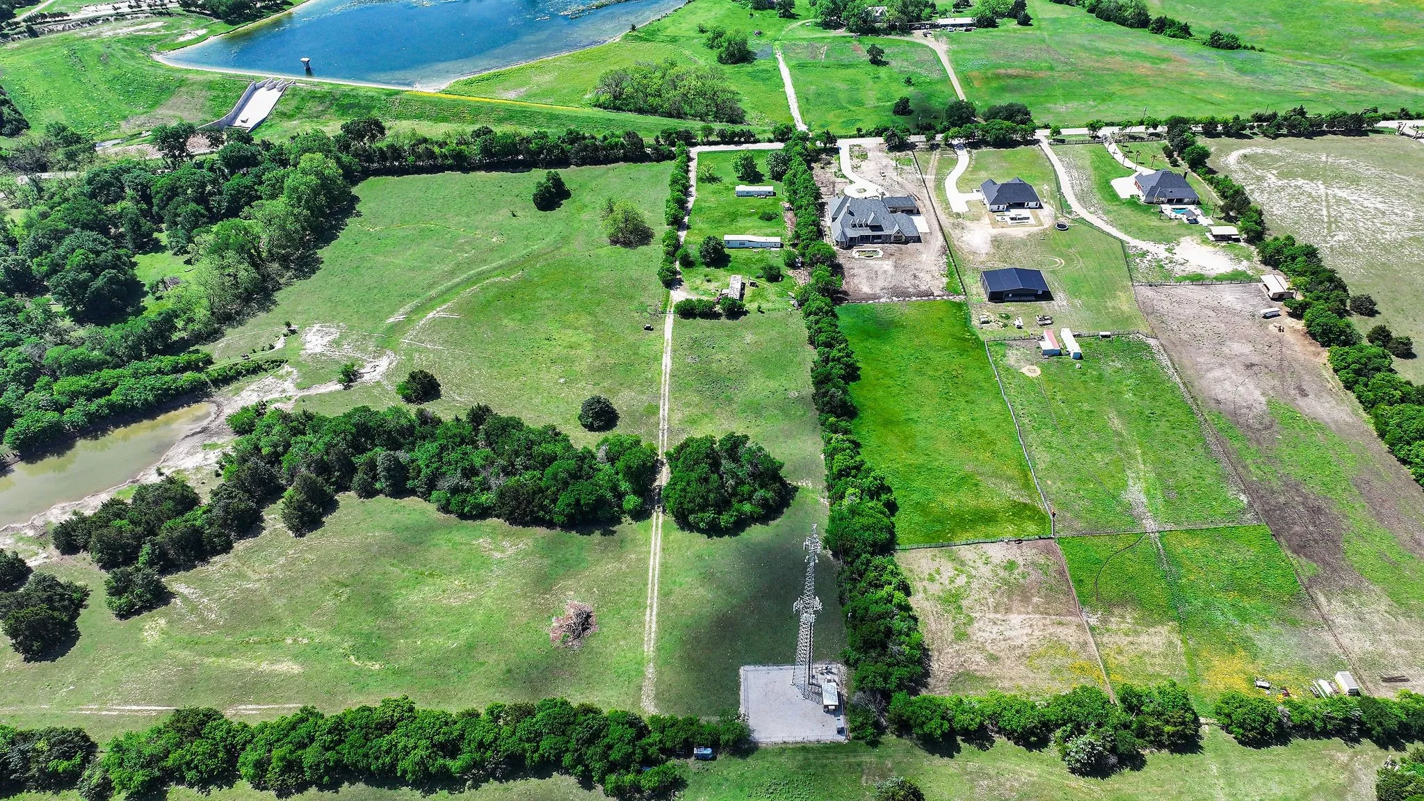 Bird's eye view featuring a water view and a rural view