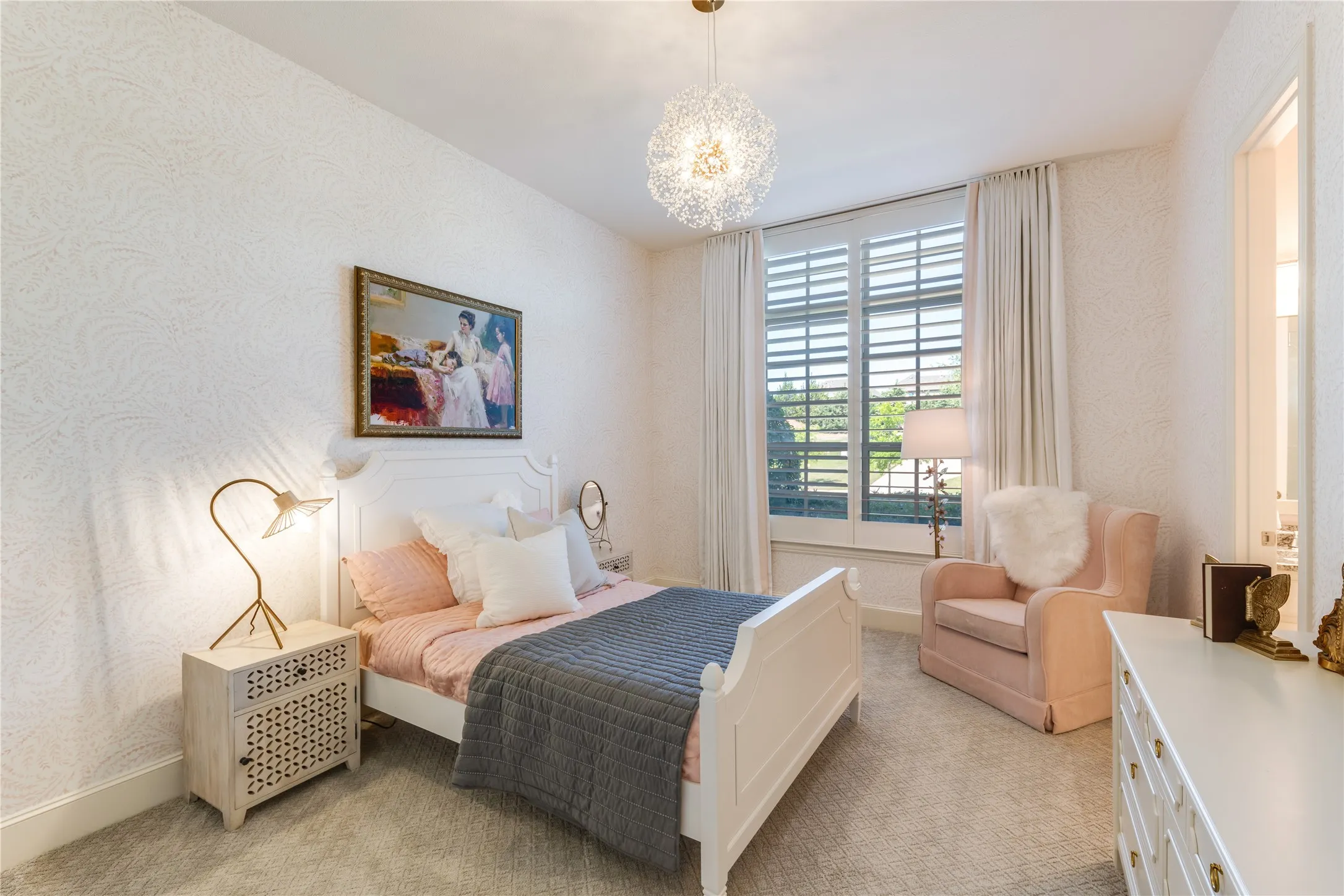 One of 4 bedrooms of the first floor, this adorable suite faces the front of the home with a cute ensuite bath to the right.
