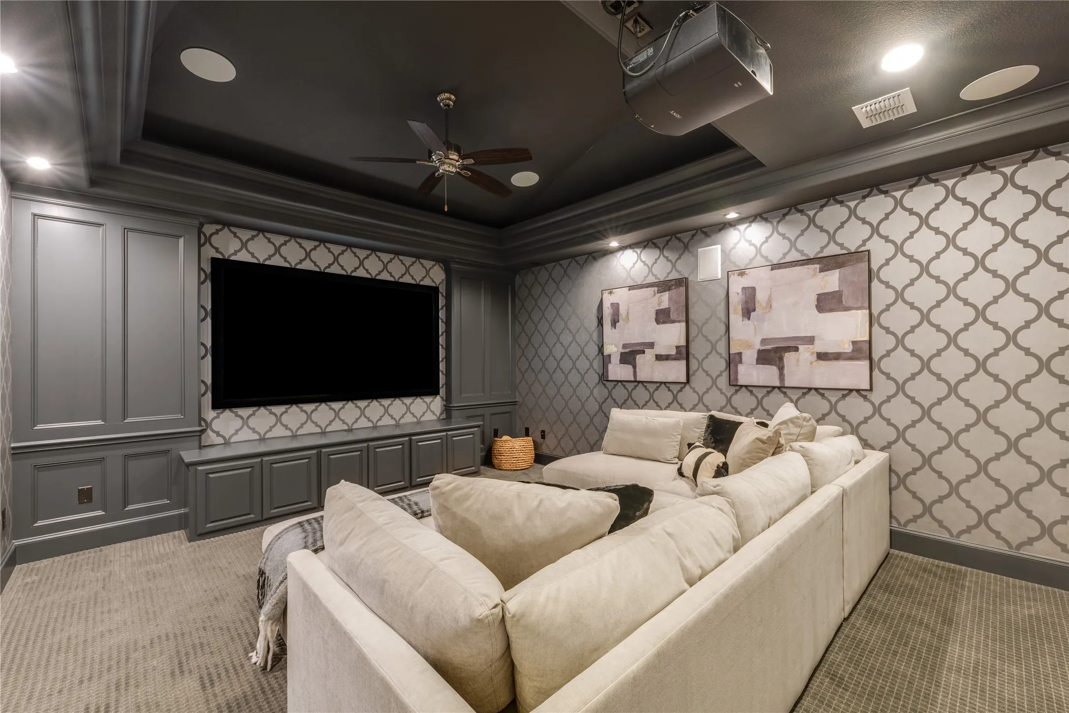 It's all about the theater experience in the media room---comfortable, immersive & built for serious movie nights. Surround sound (7.x.4) soundproofed walls + ceiling & in-wall speakers, 4K Sony projector & a 100" screen---it's the kind of space that feels like an escape without leaving home.