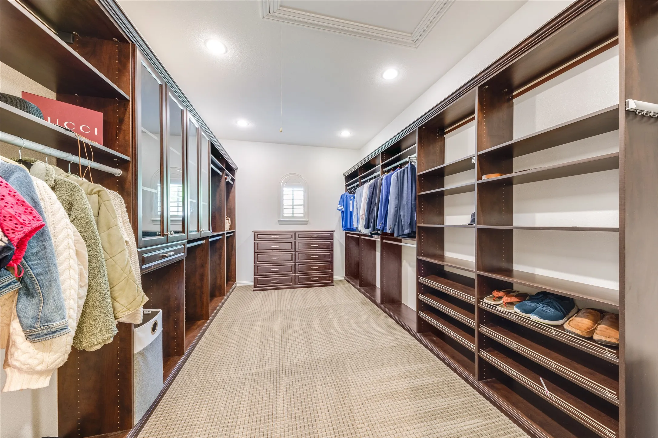 A custom closet design that's meticulously crafted to fit specific needs & space tailored to the owner's wardrobe.