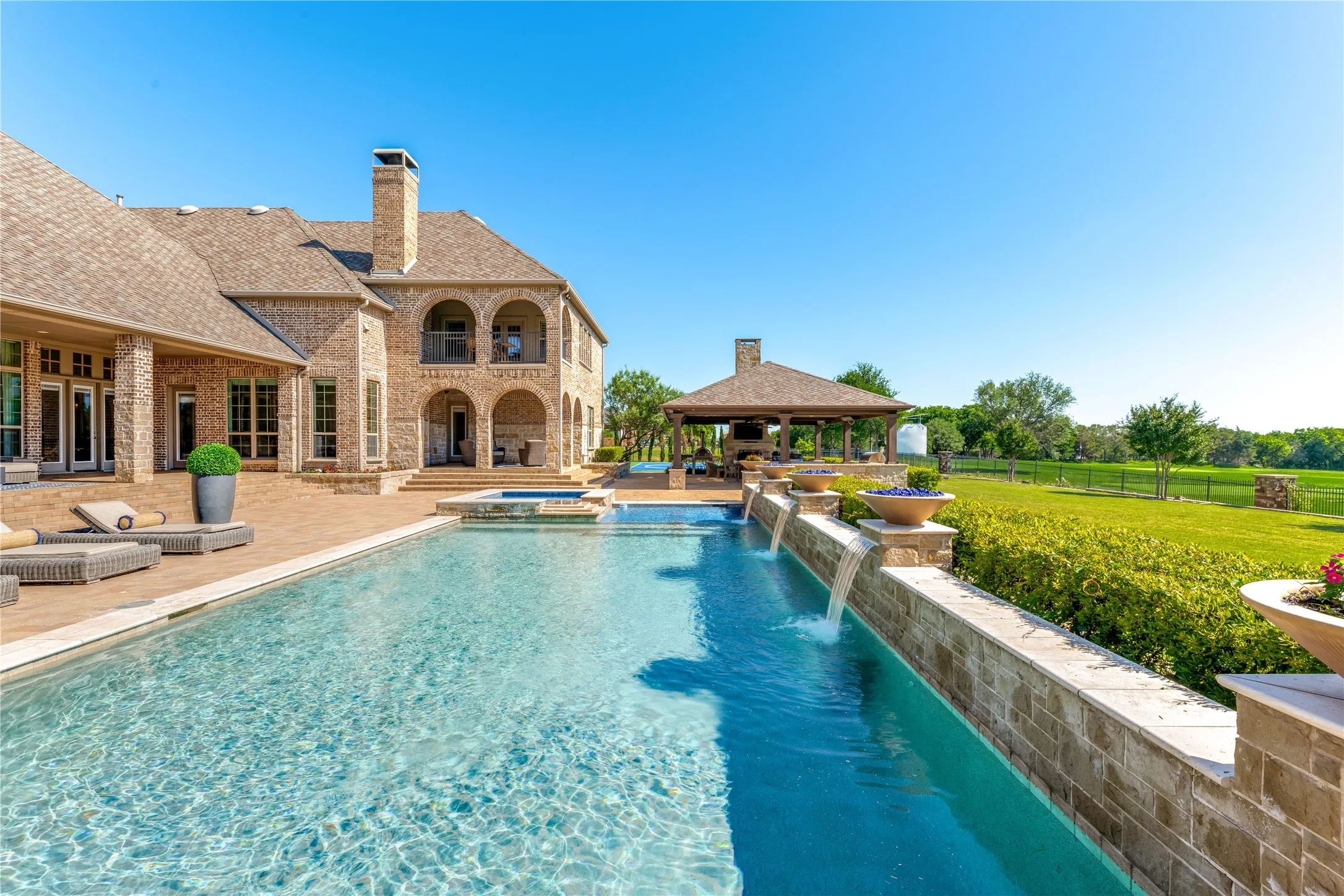 Just in time for Spring-Summer swimming, the heated pool/spa is your staycation opportunity to relax or exercise. The extensive pavered patio offers plenty of room for lounging furniture.