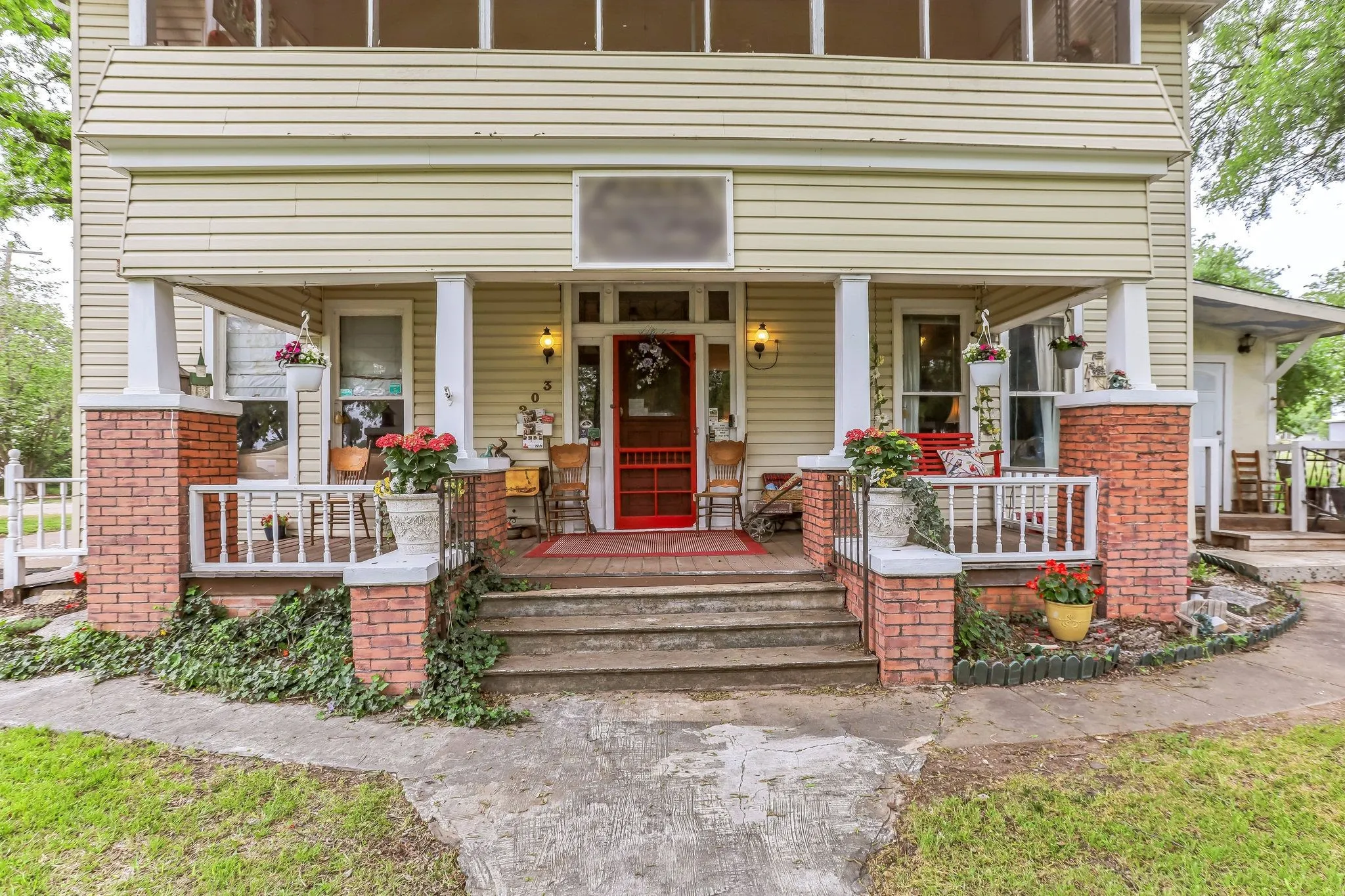 View of front of property with covered porch