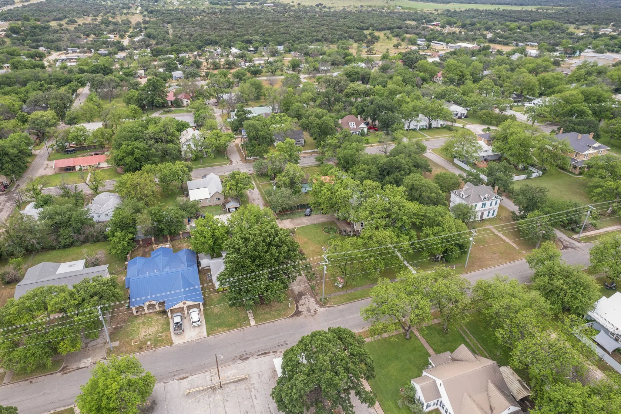 Birds eye view of property with a residential view