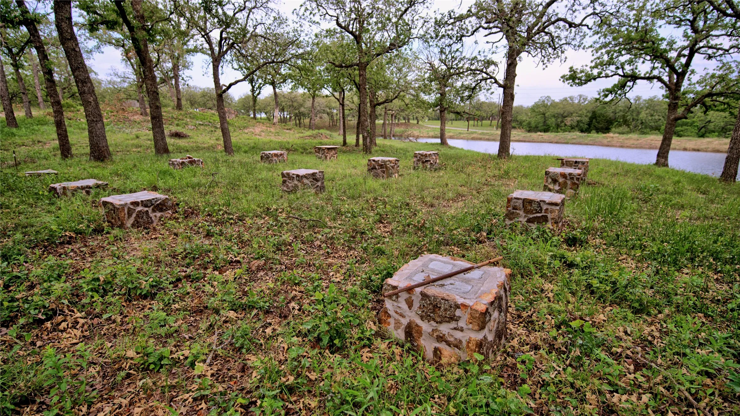 View of yard with a water view