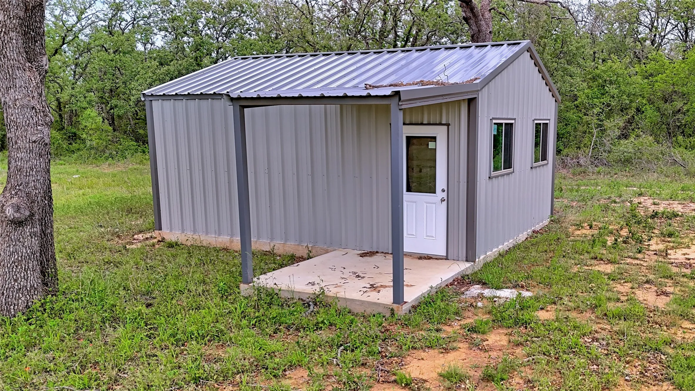 View of outbuilding featuring an outdoor structure