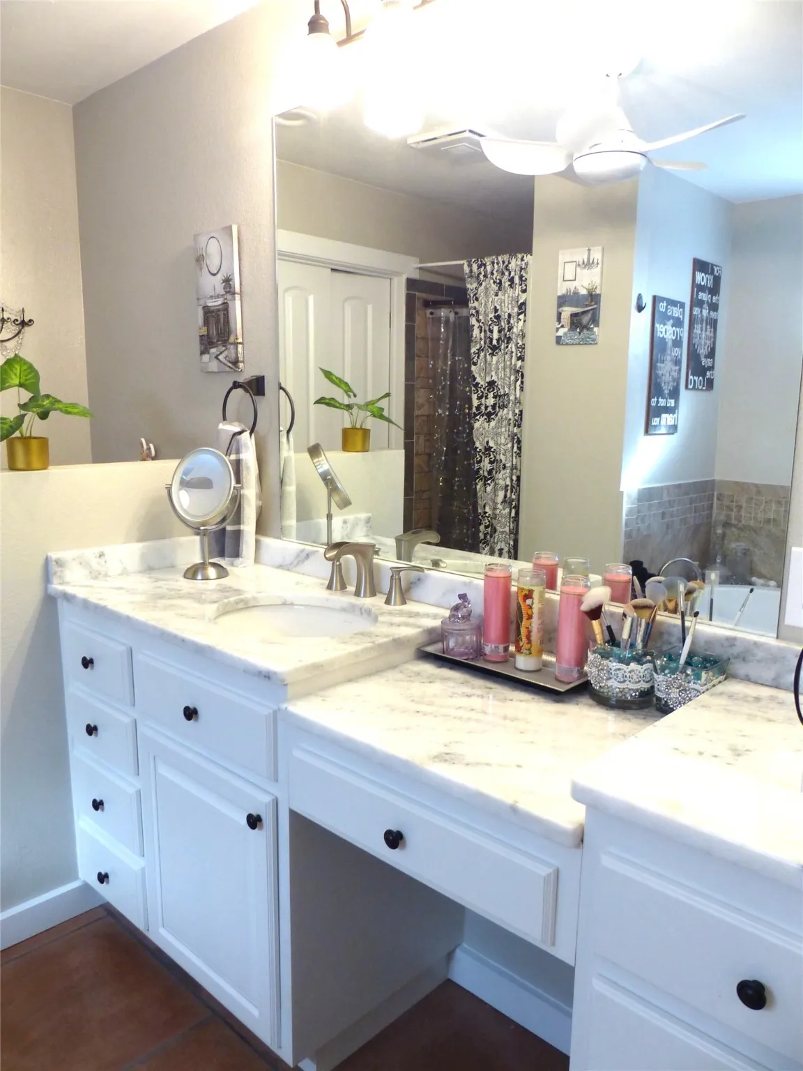 Full bathroom featuring vanity and a shower with shower curtain