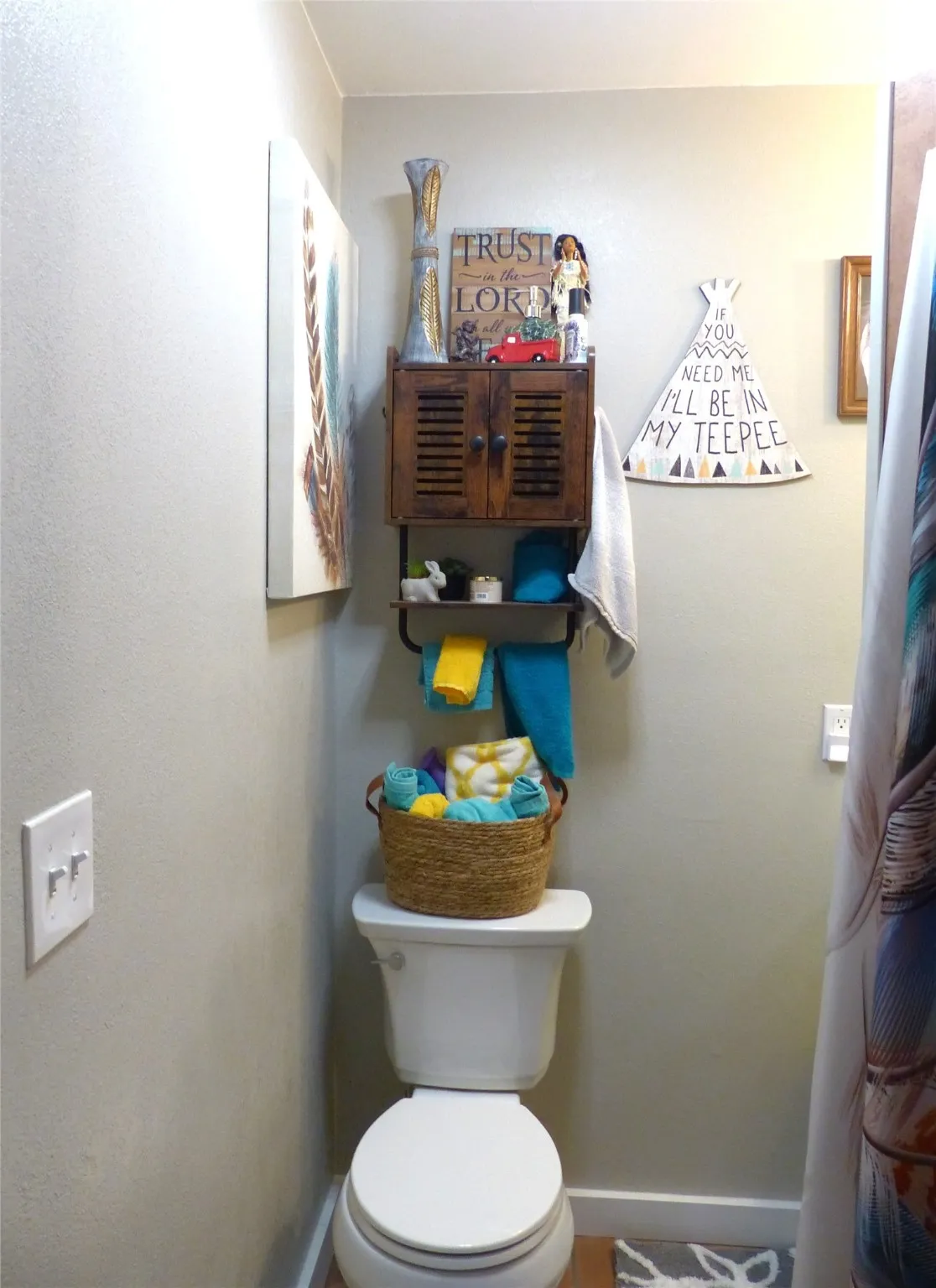 Bathroom with toilet and baseboards