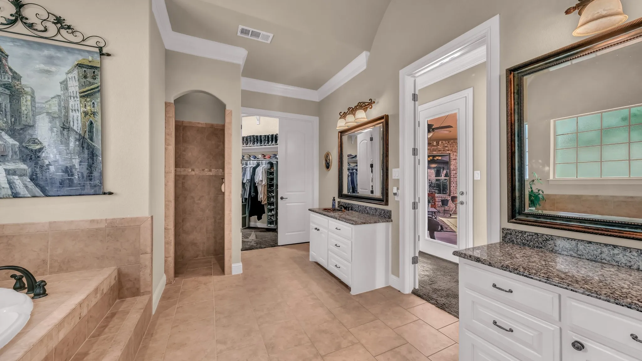 Full bathroom featuring visible vents, ornamental molding, tile patterned floors, and vanity