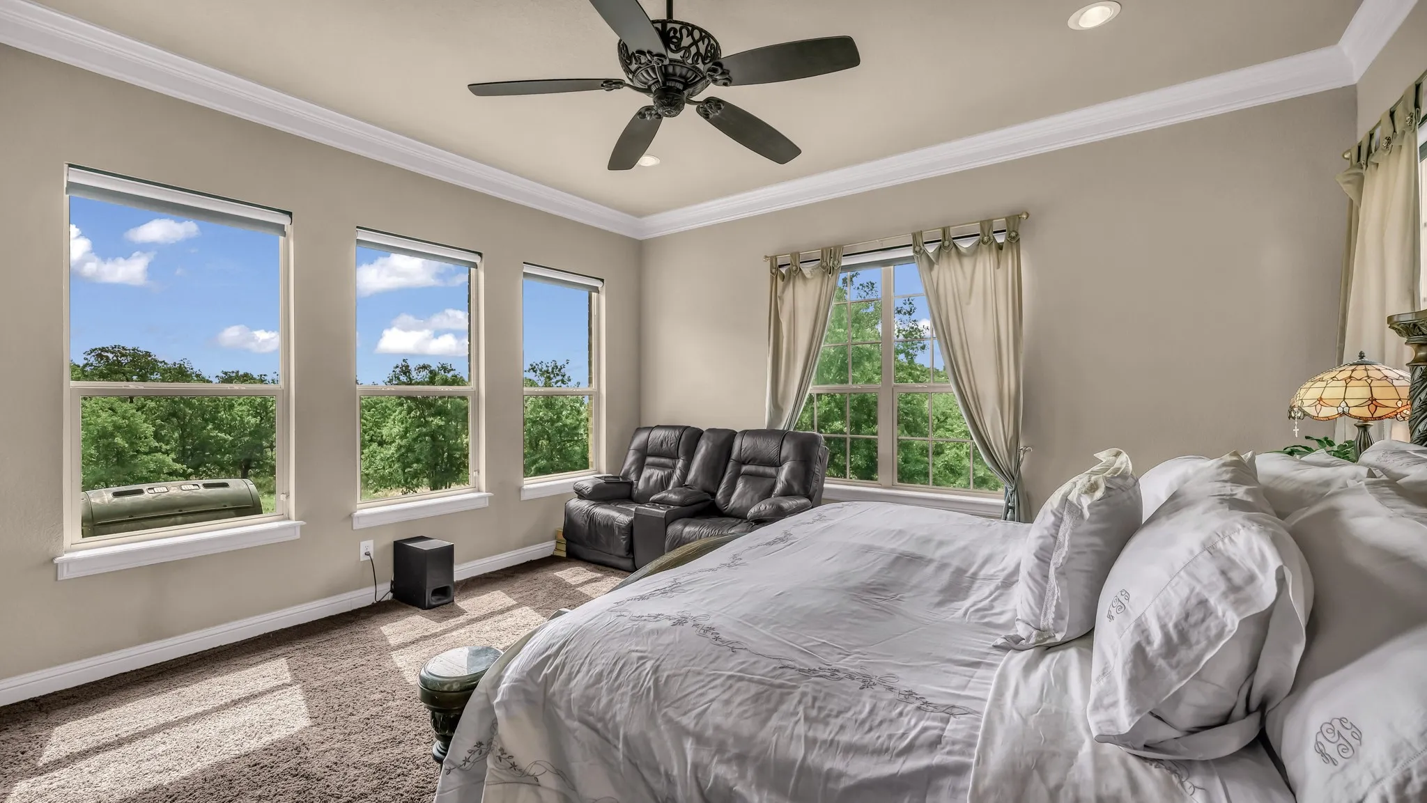 Bedroom with baseboards, recessed lighting, crown molding, and ceiling fan