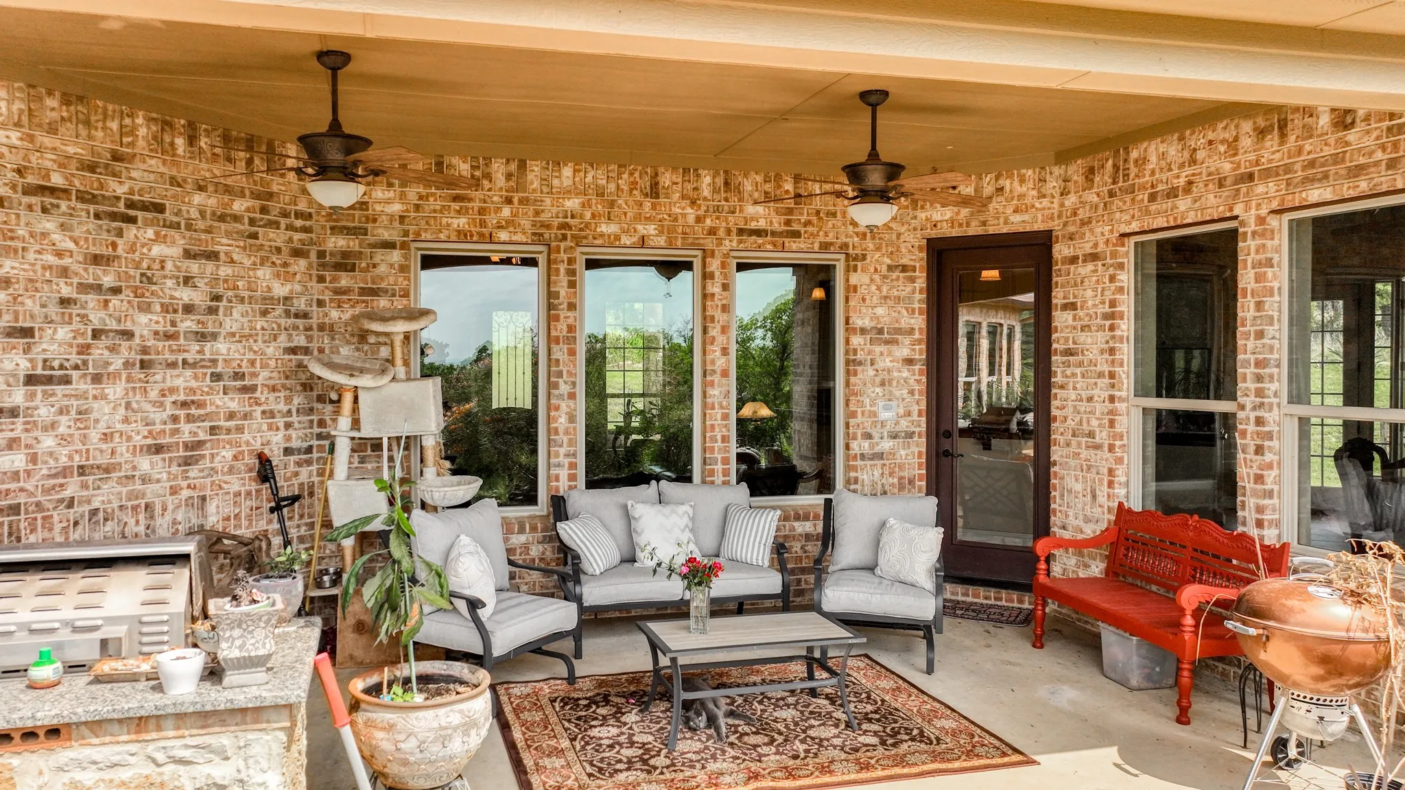 View of patio / terrace featuring outdoor lounge area and a ceiling fan